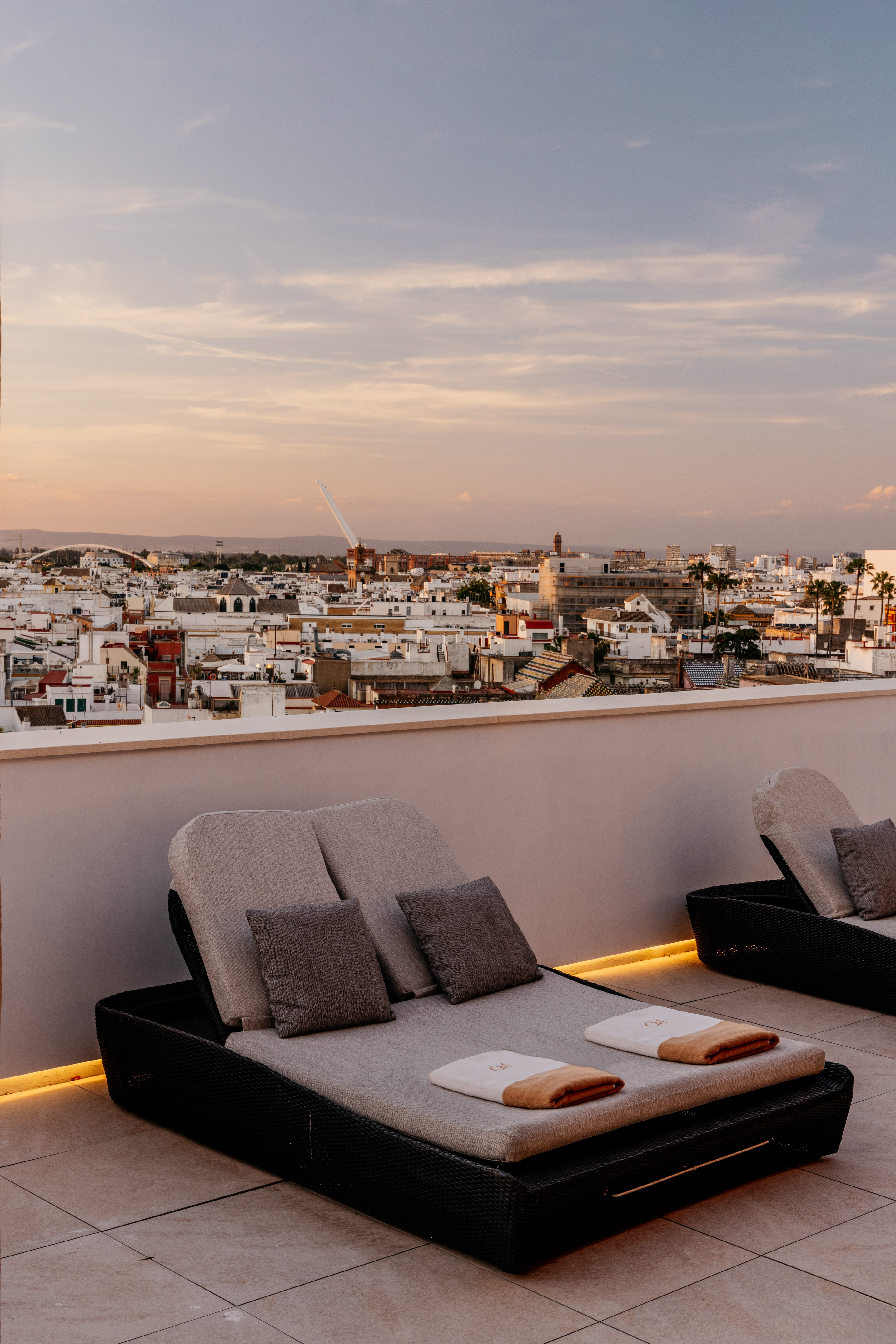 a group of chairs on a rooftop