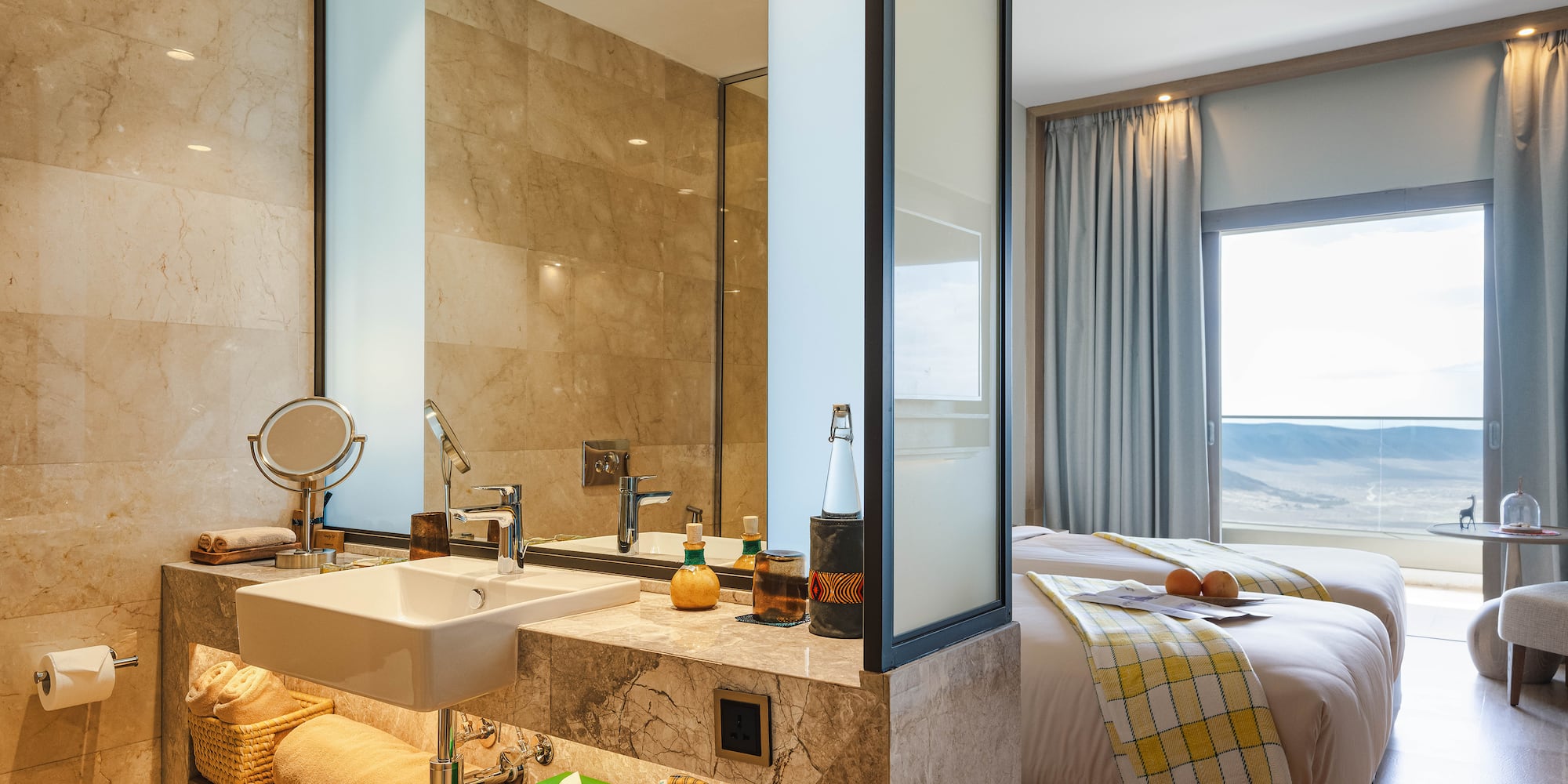 a bathroom with a bed and sink