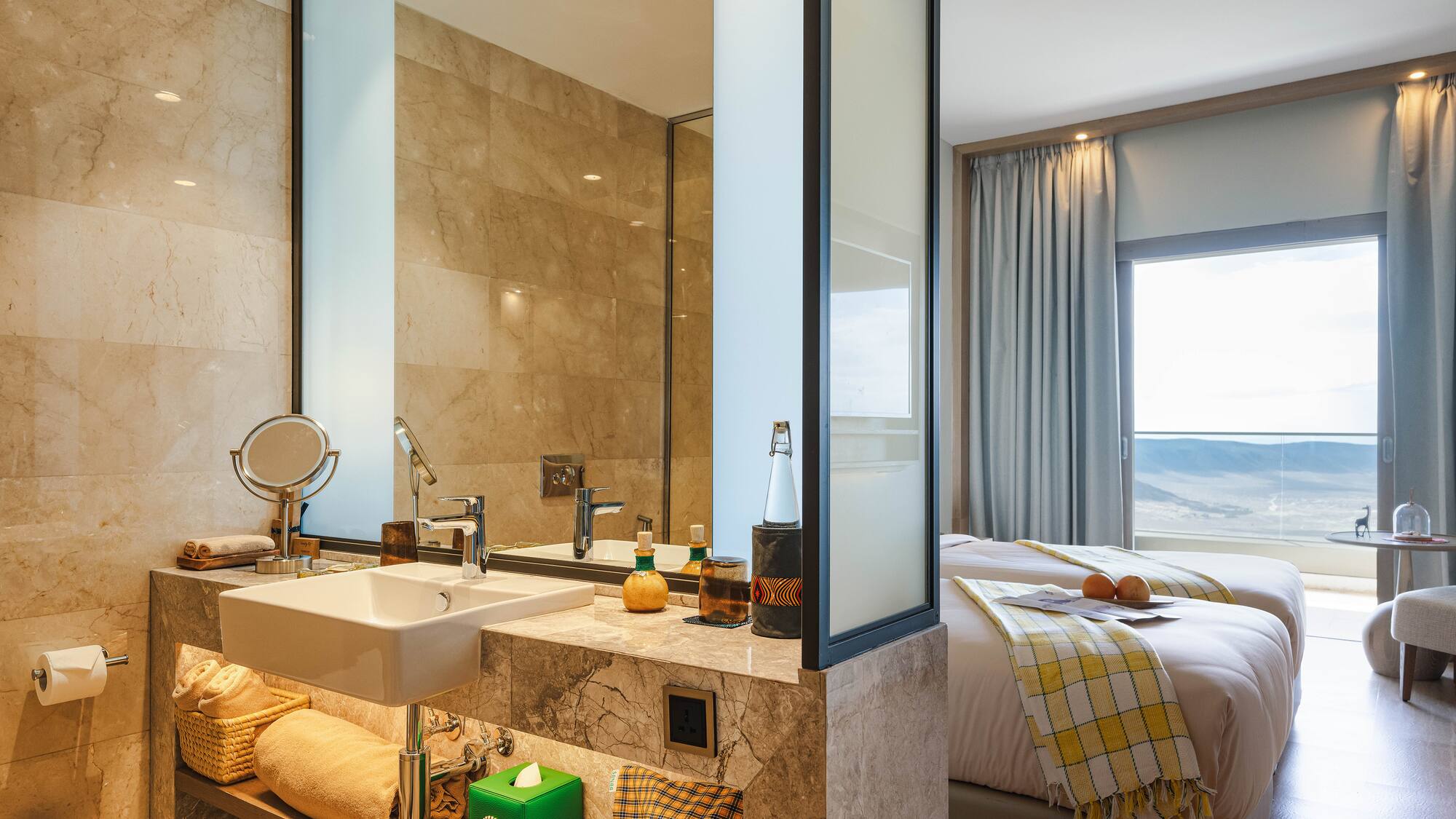 a bathroom with a bed and sink