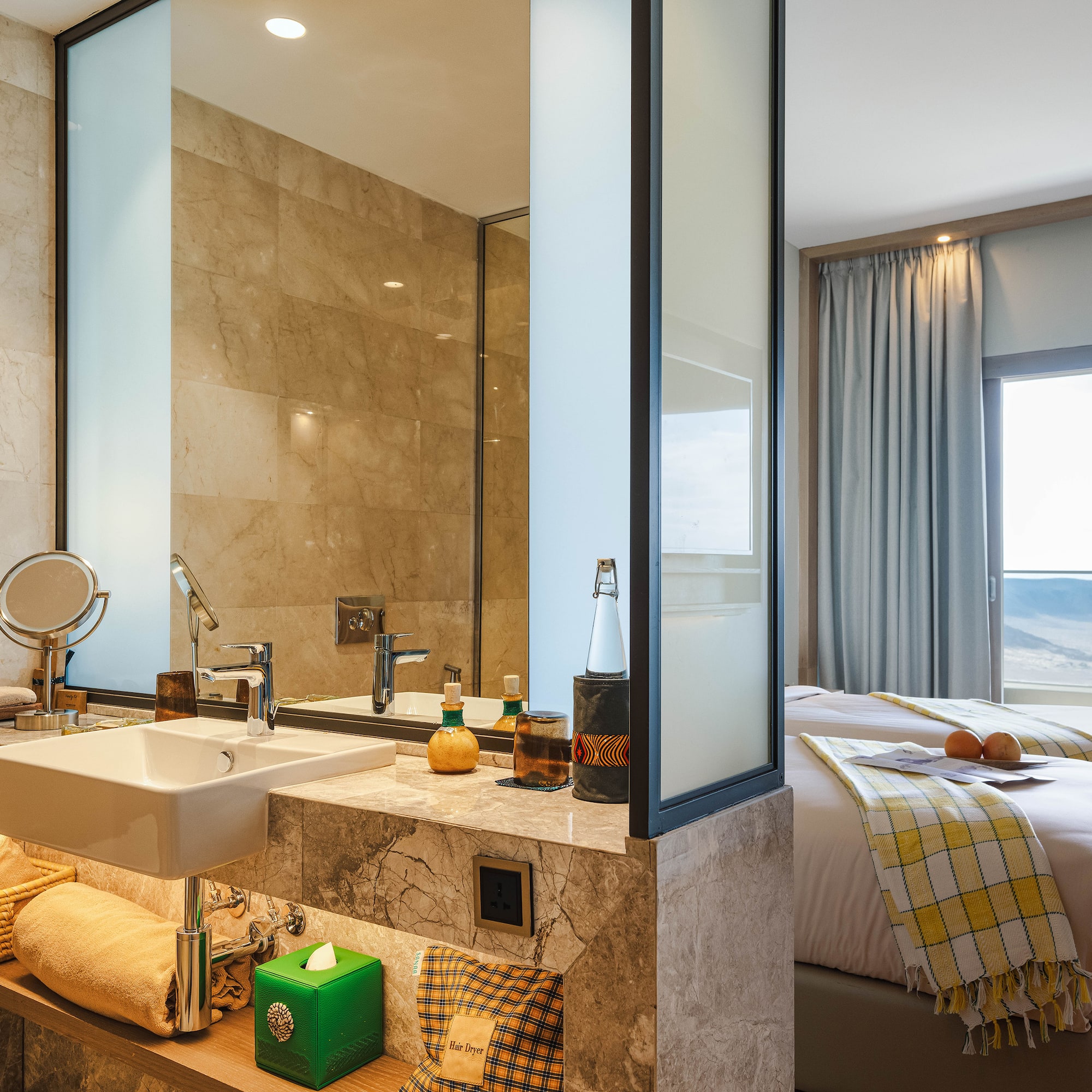 a bathroom with a bed and sink