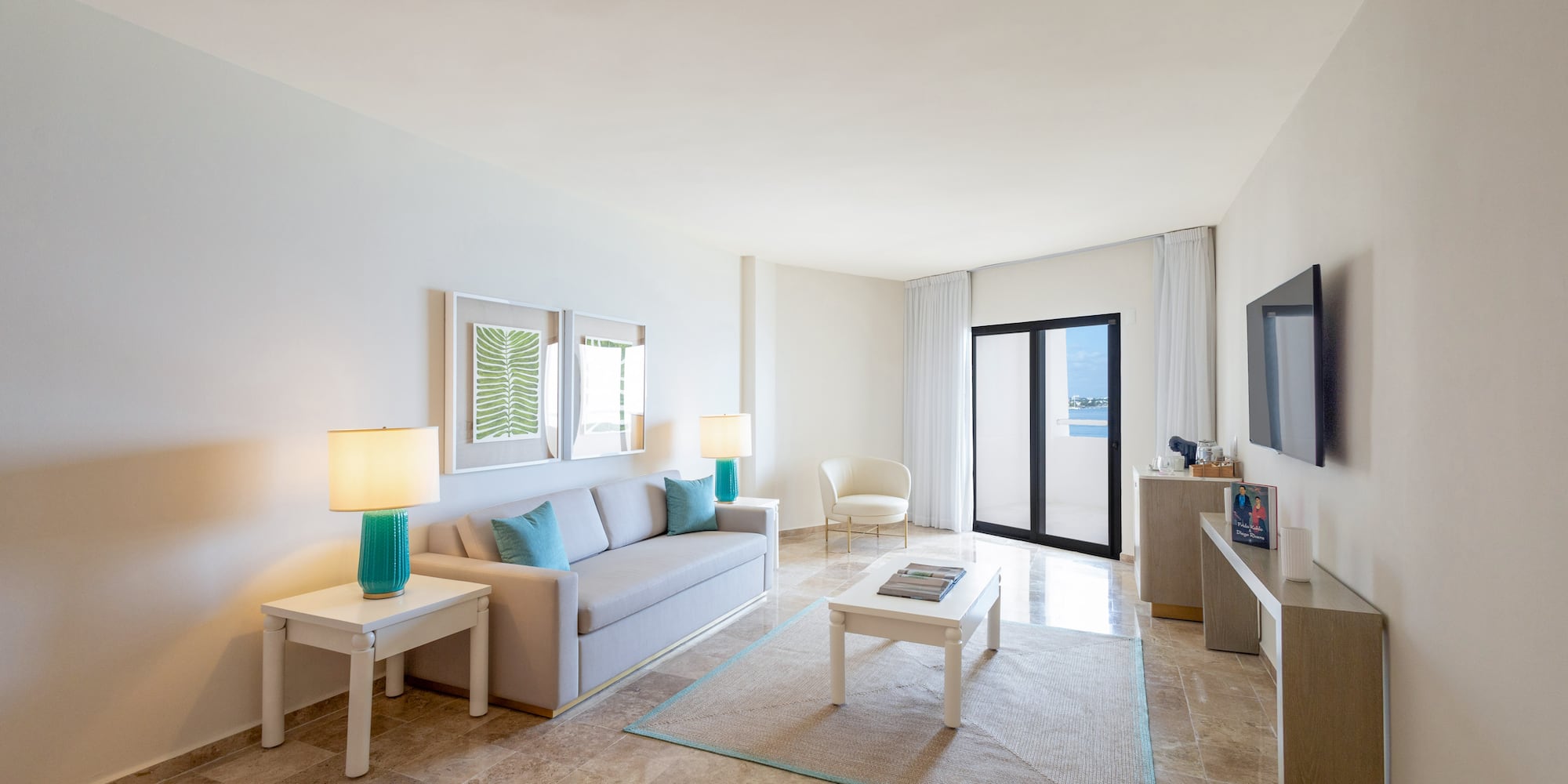 a living room with a television and a couch