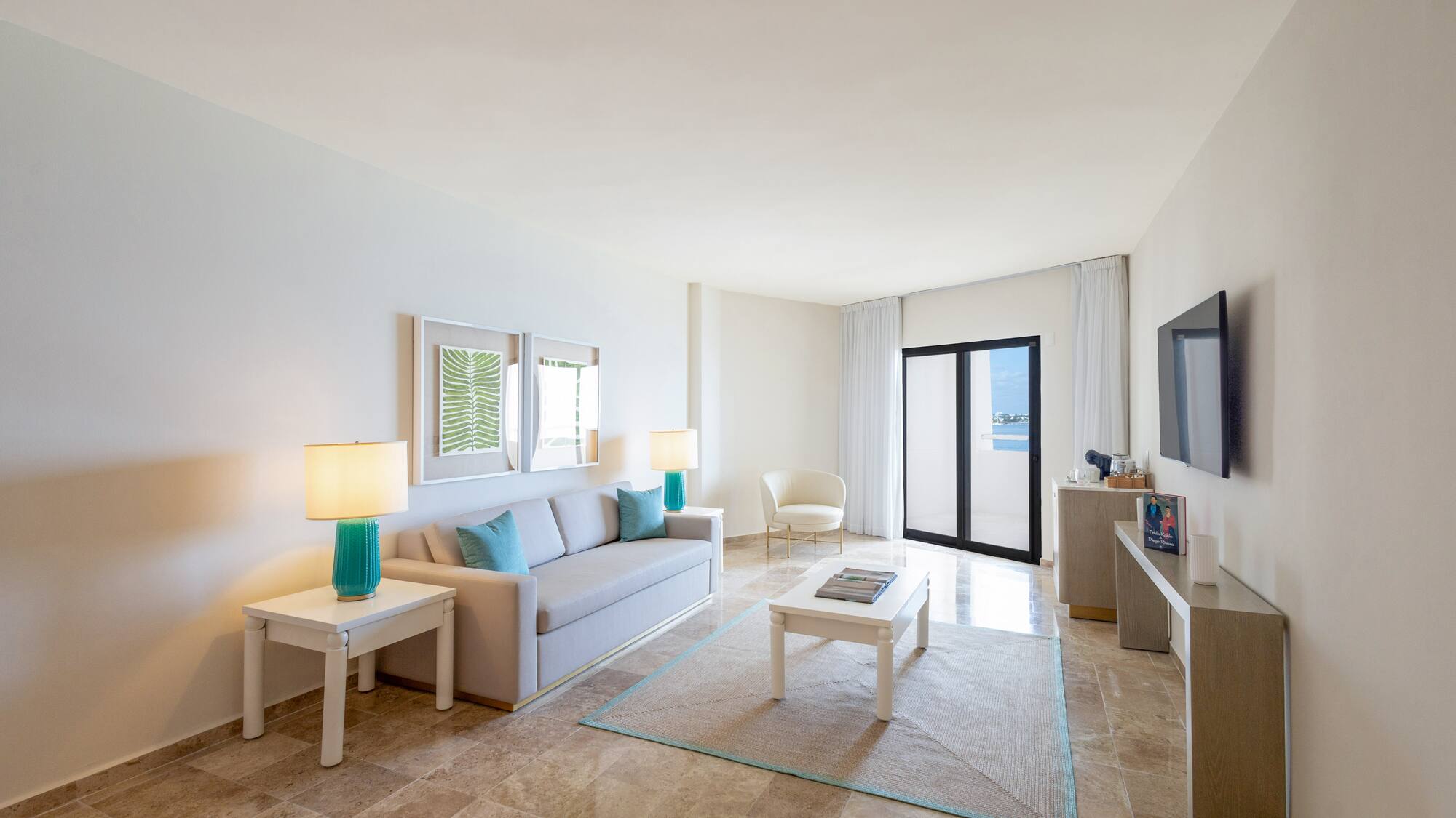 a living room with a television and a couch