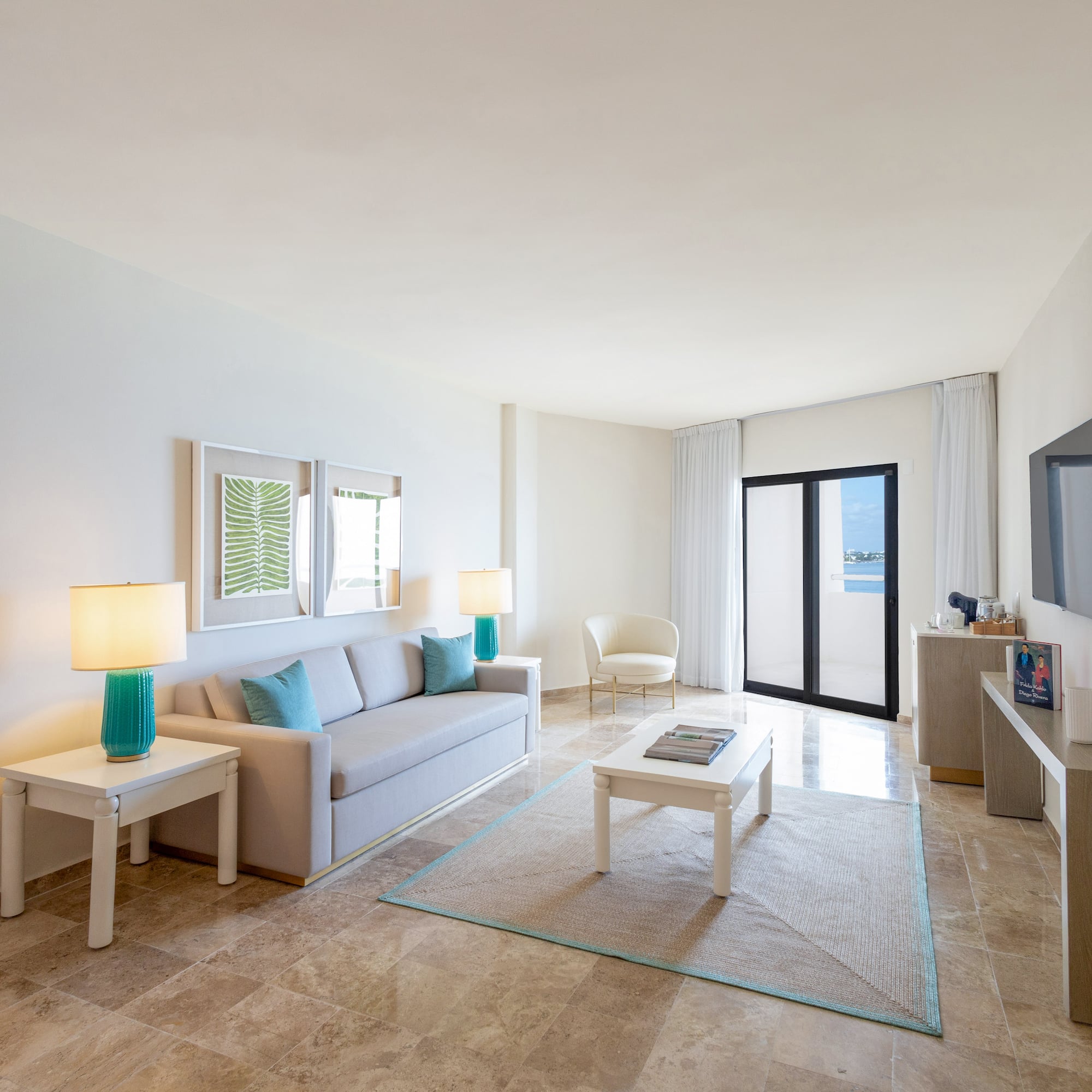 a living room with a television and a couch