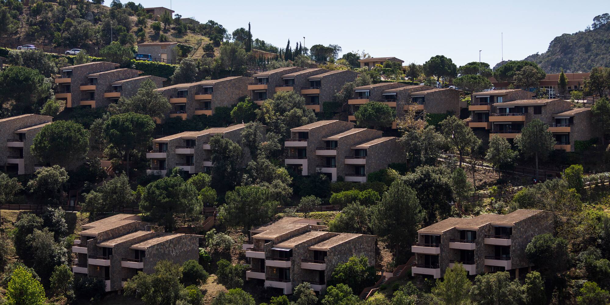 a group of buildings on a hill