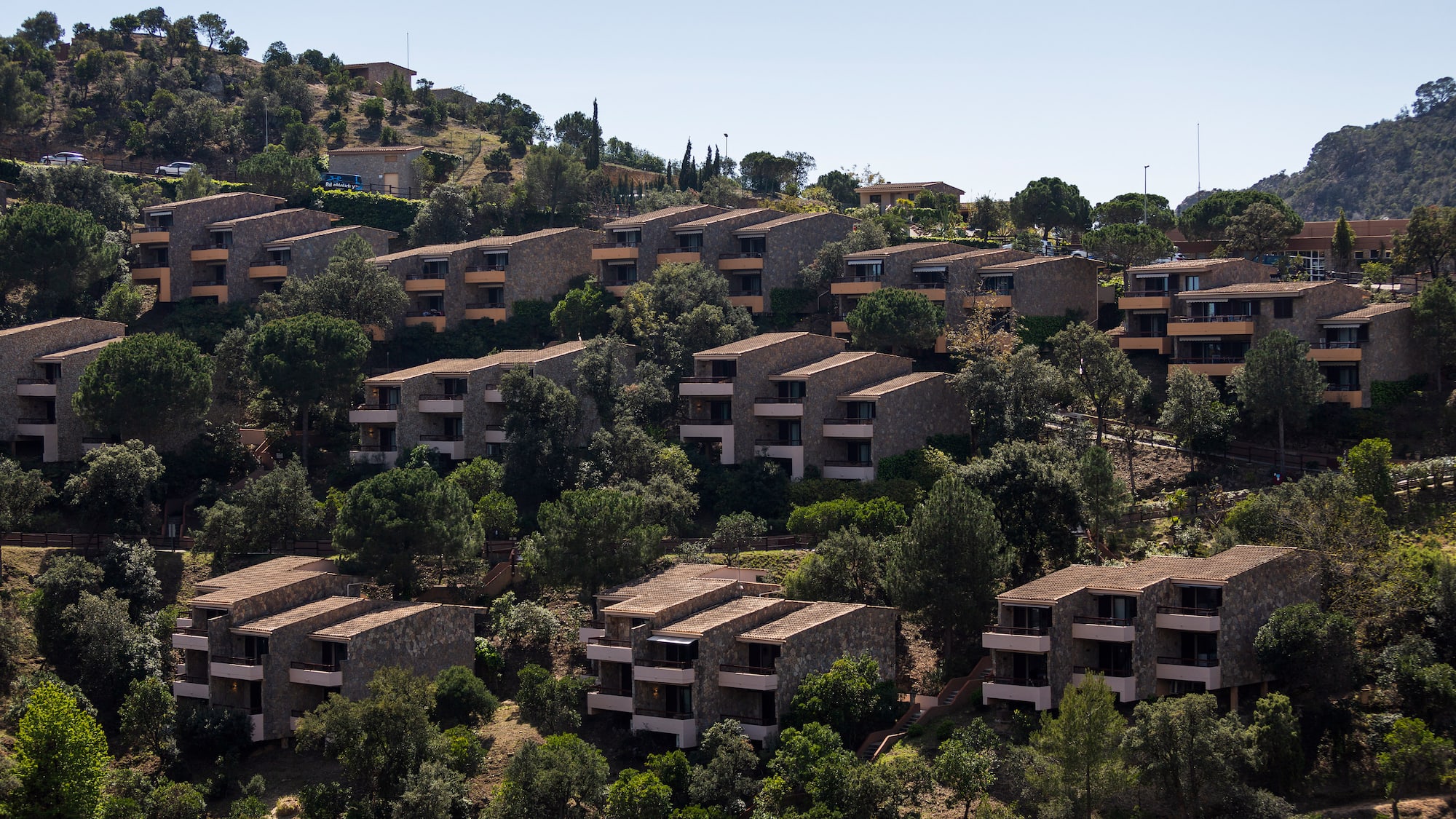 a group of buildings on a hill