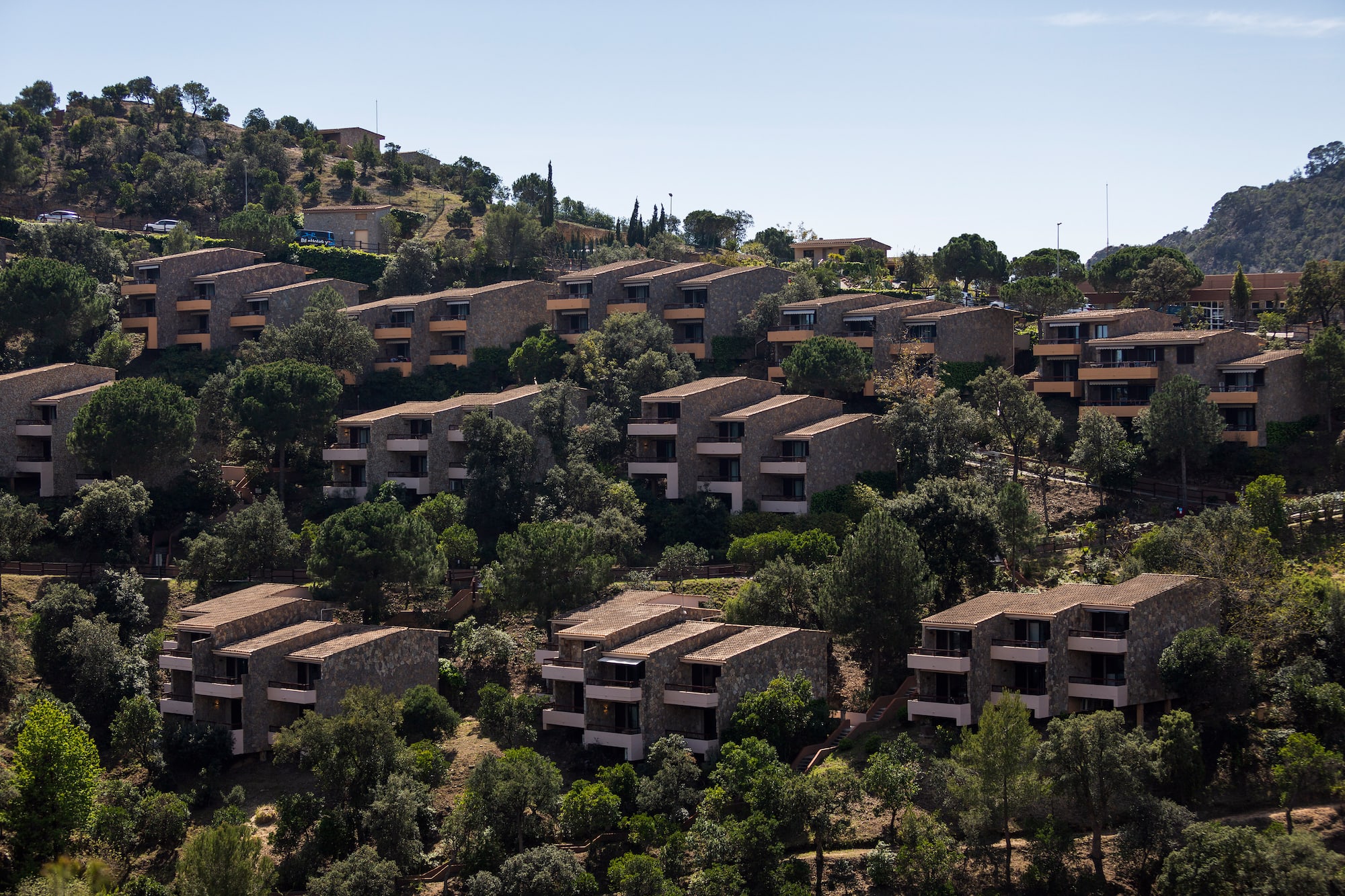 a group of buildings on a hill