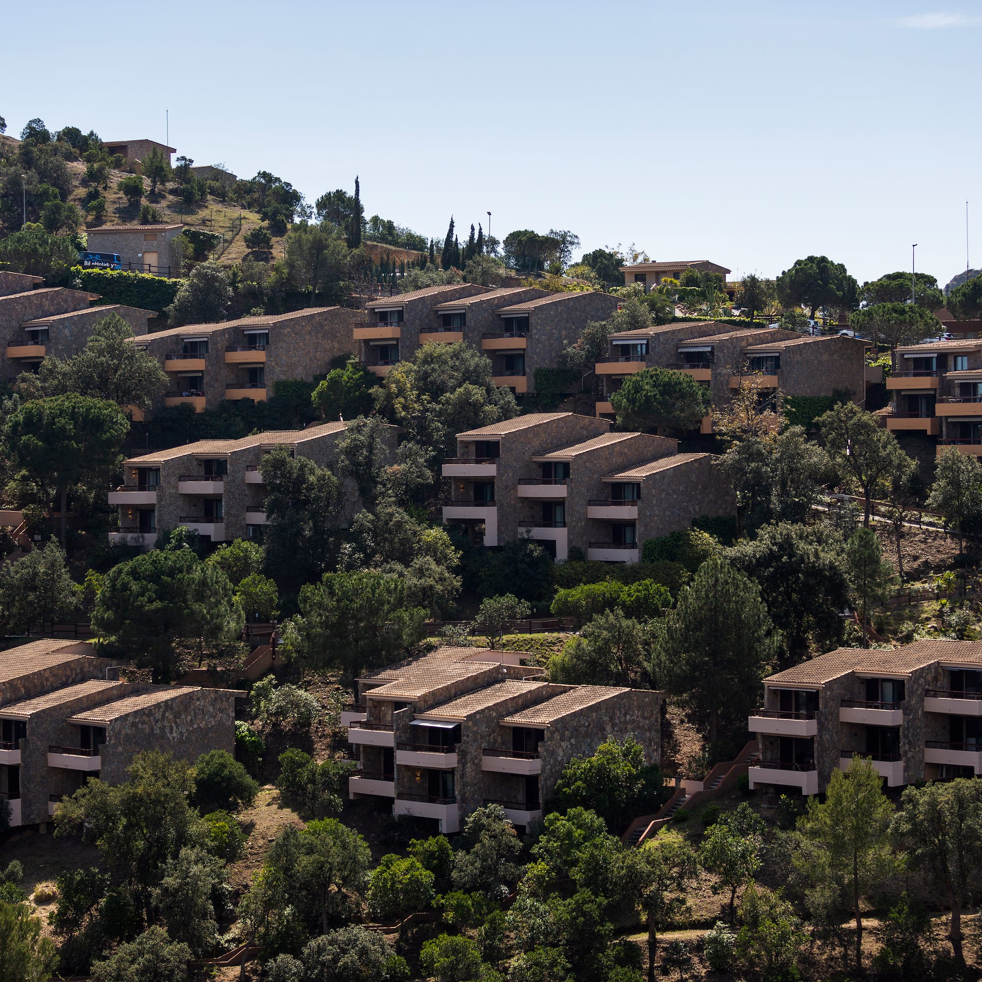 a group of buildings on a hill