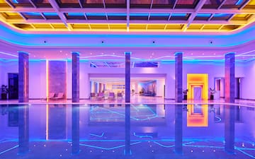 a pool with colorful lights