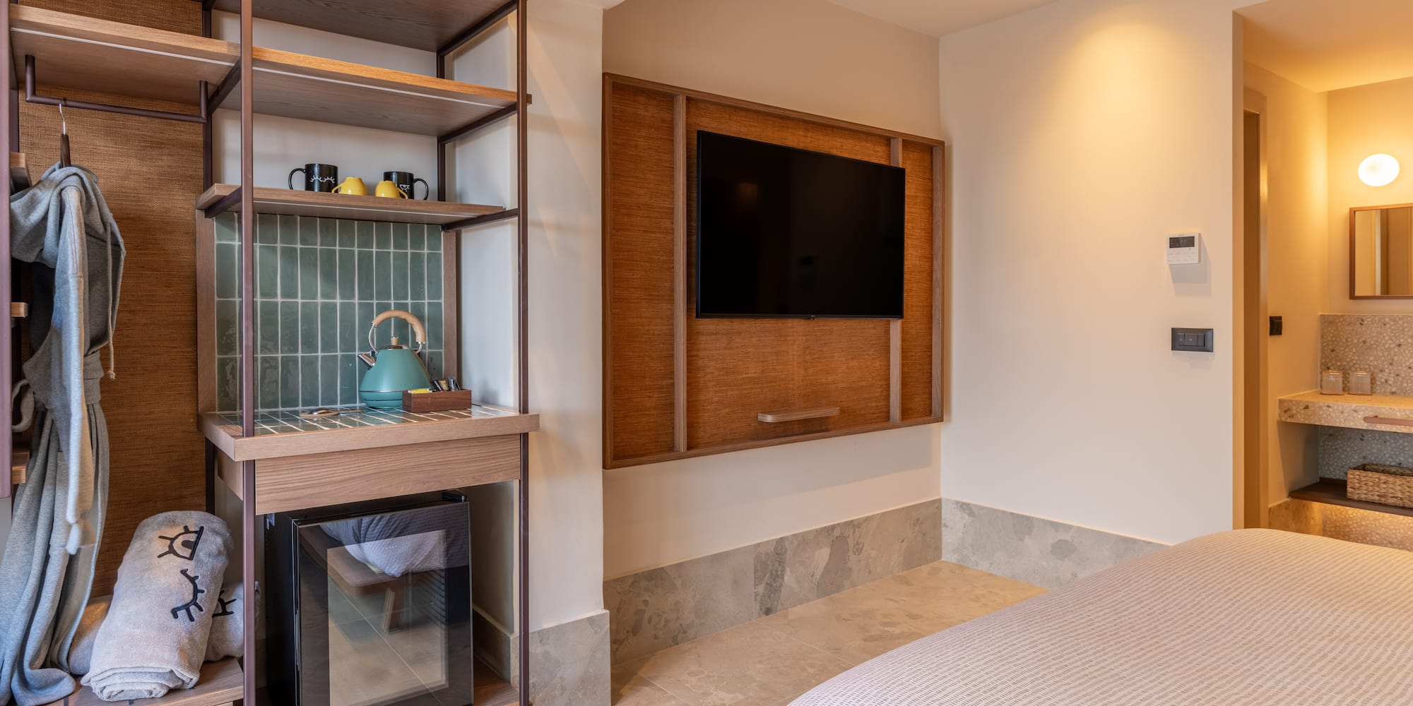 a room with a tv and a shelf