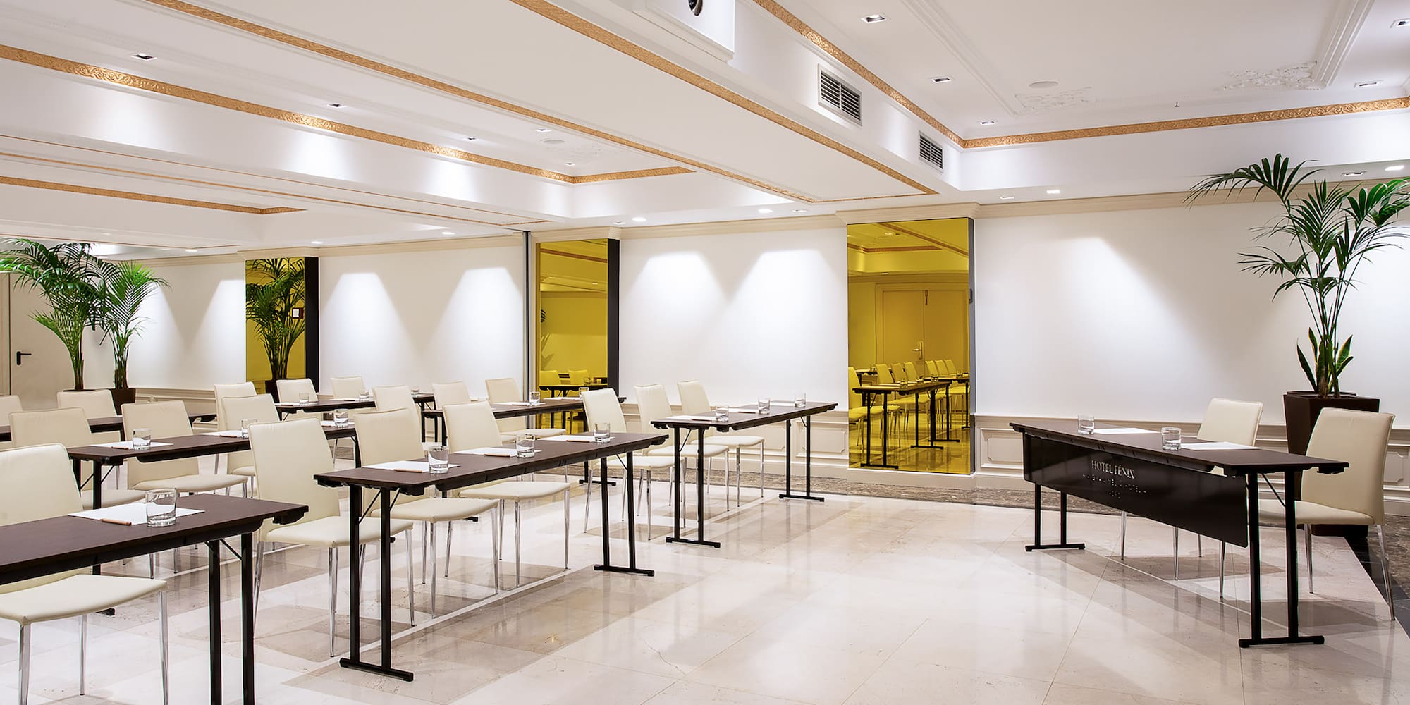 a room with tables and chairs