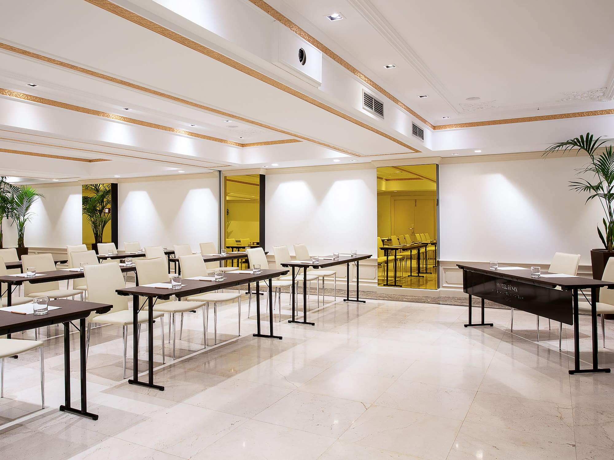 a room with tables and chairs