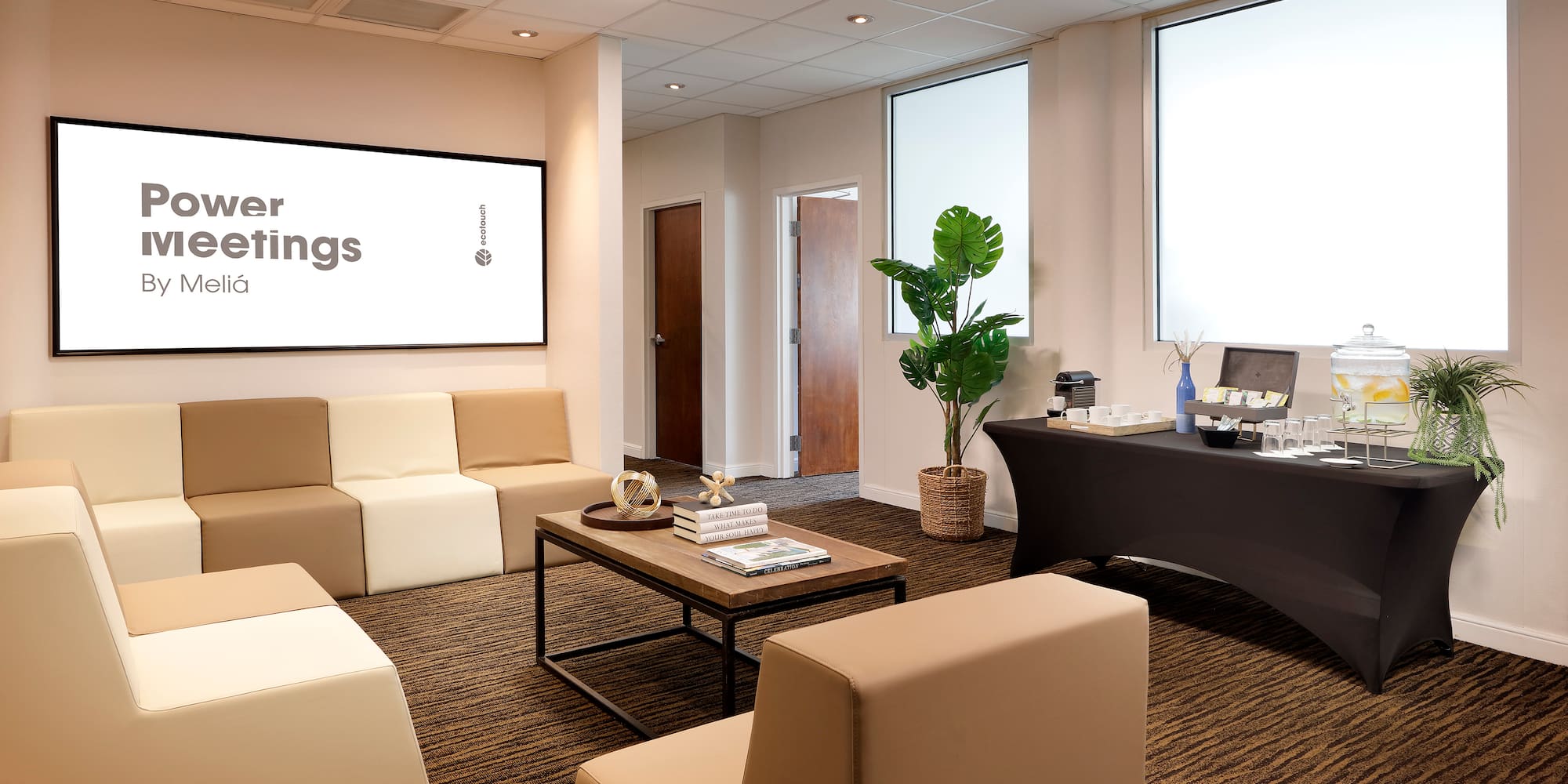 a room with couches and a table