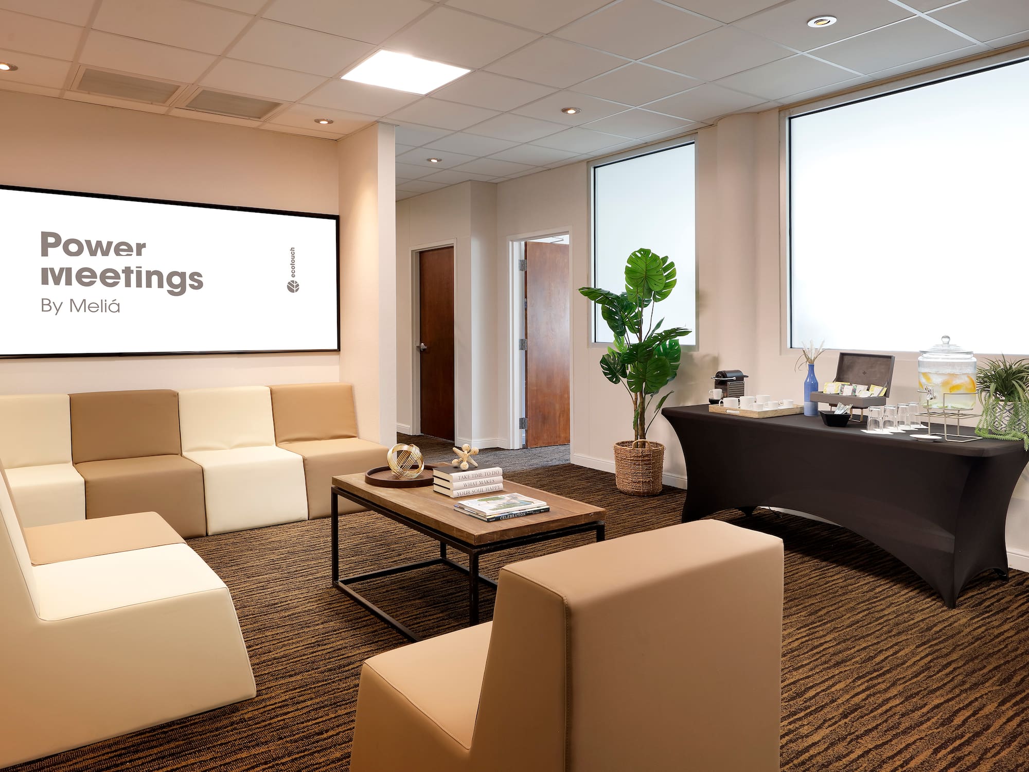 a room with couches and a table