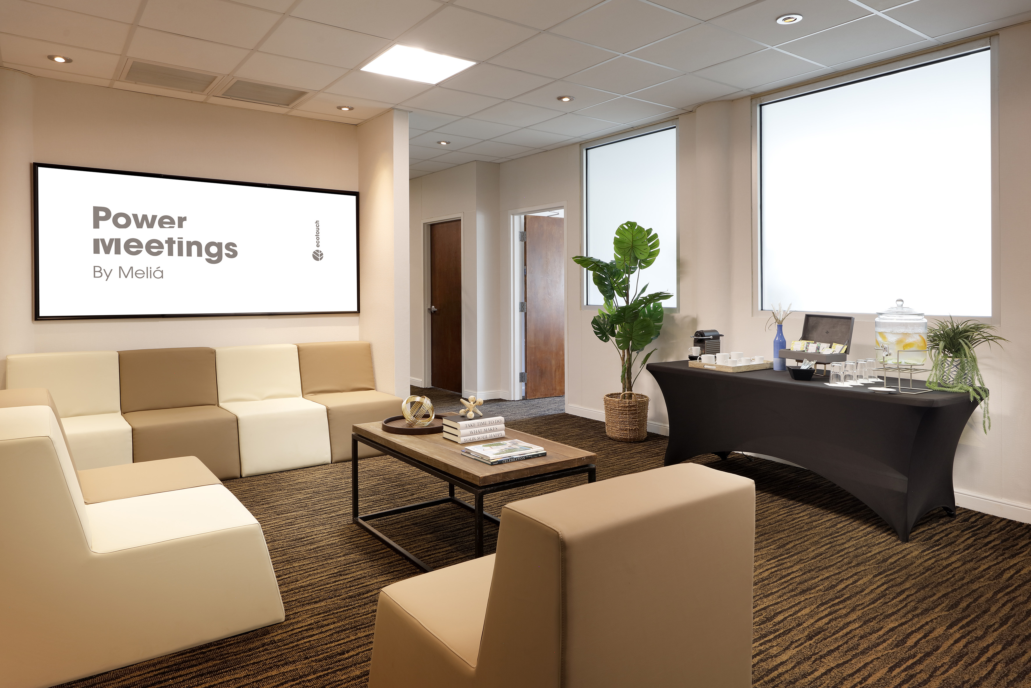 a room with couches and a table