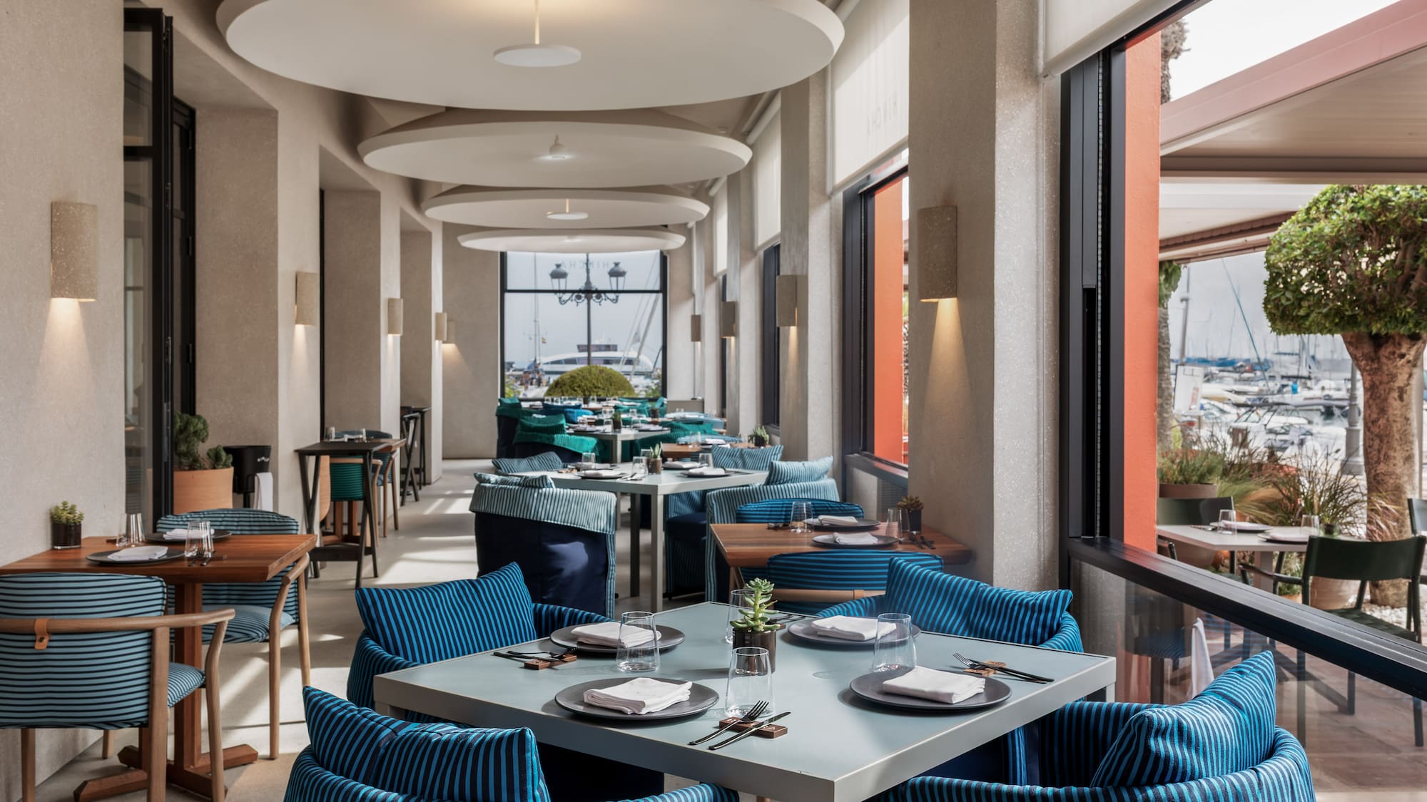 a restaurant with tables and chairs