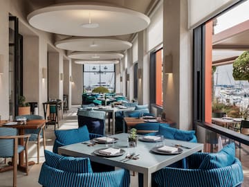 a restaurant with tables and chairs