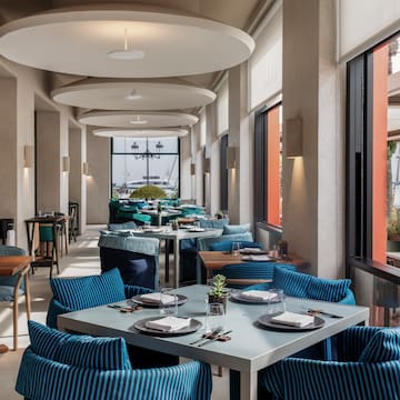 a restaurant with tables and chairs