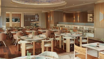 a restaurant with tables and chairs