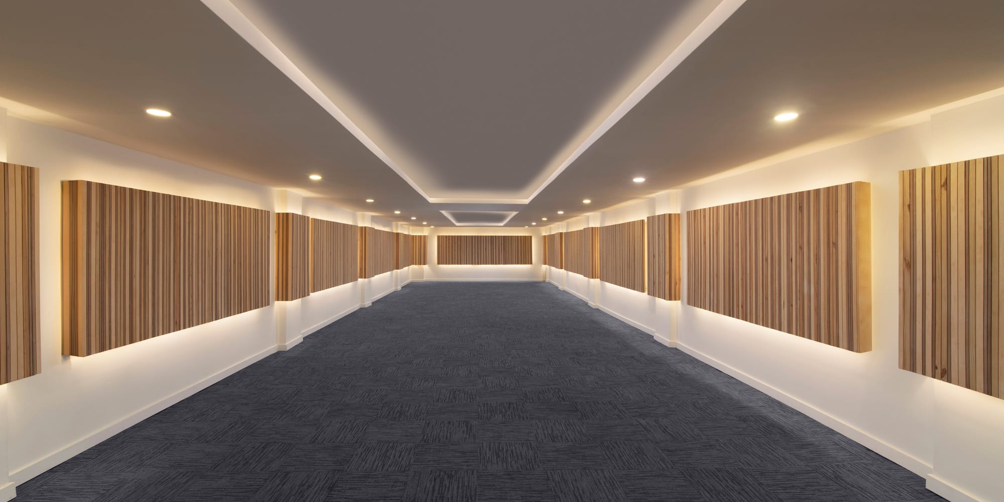 a long hallway with wood panels on the wall