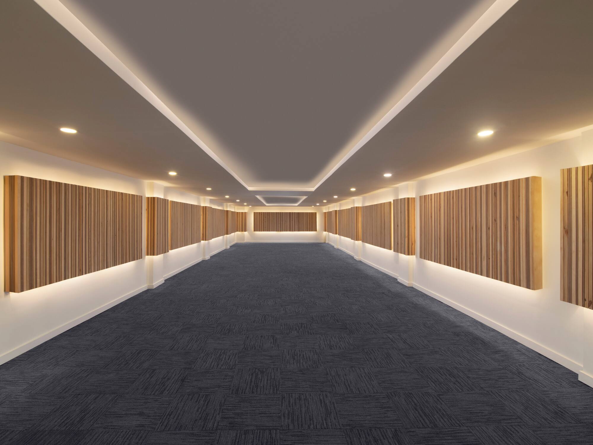 a long hallway with wood panels on the wall
