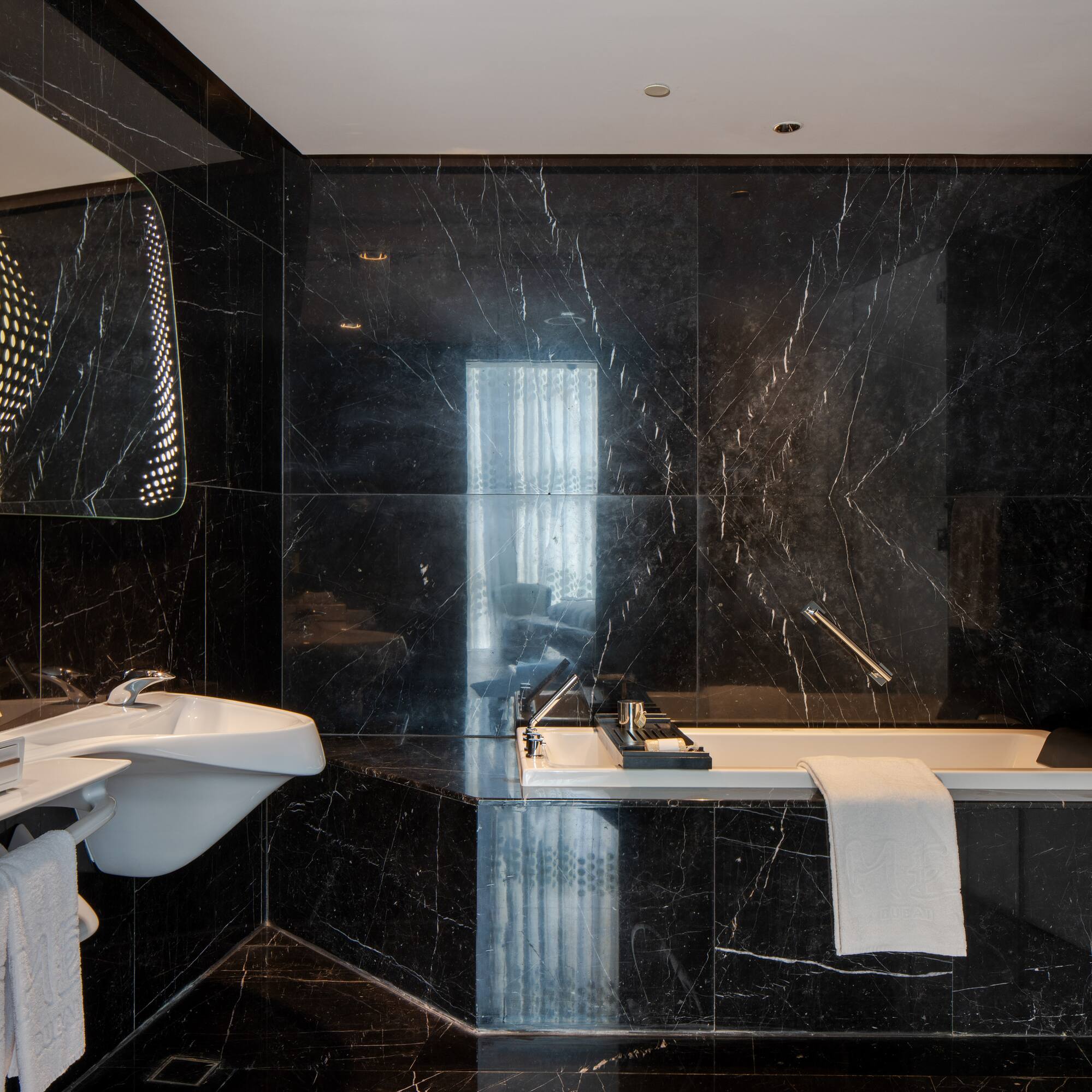 a bathroom with a sink and a bathtub