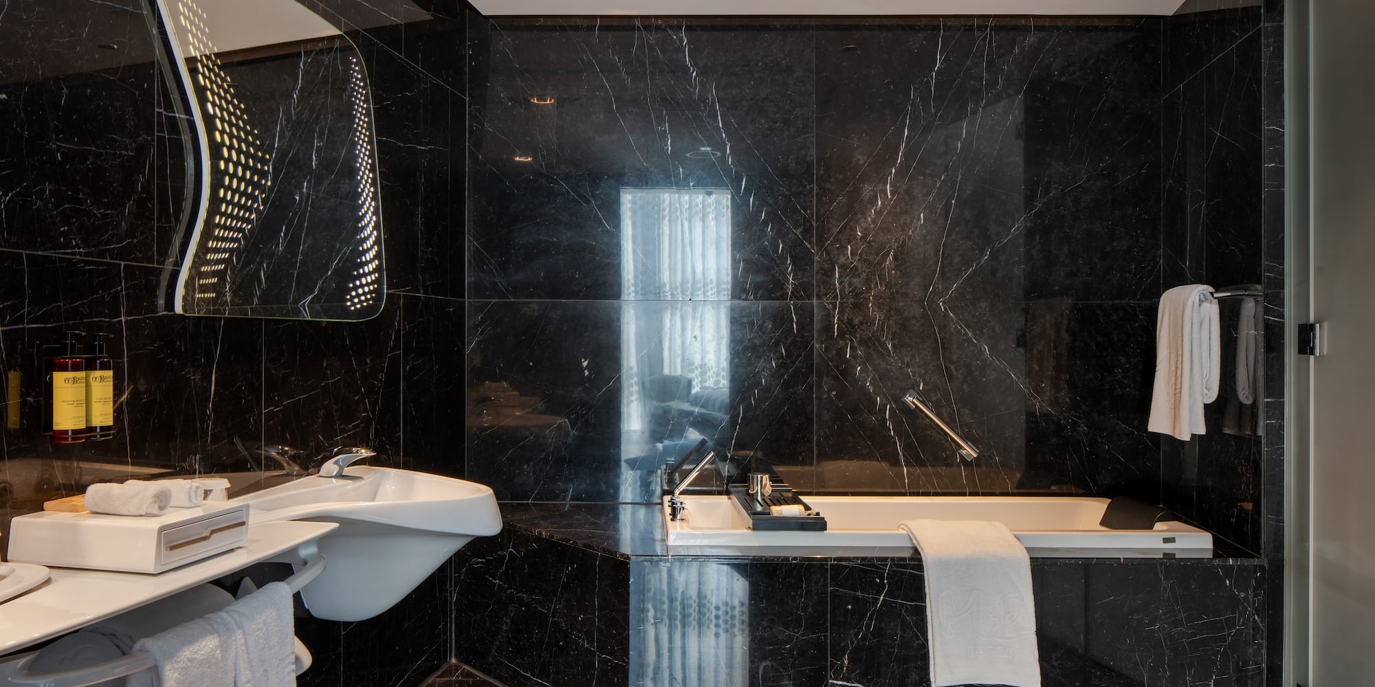 a bathroom with a sink and a bathtub