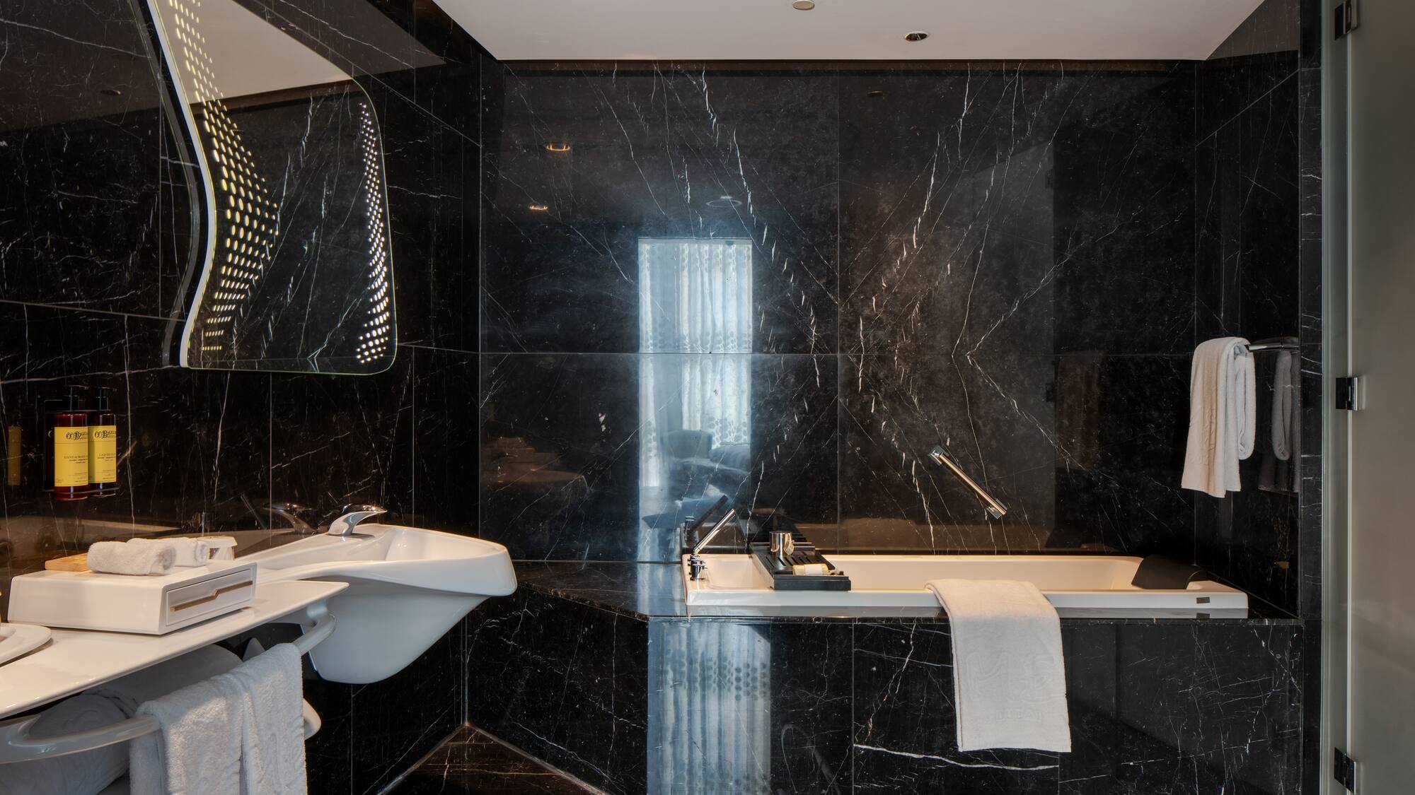 a bathroom with a sink and a bathtub