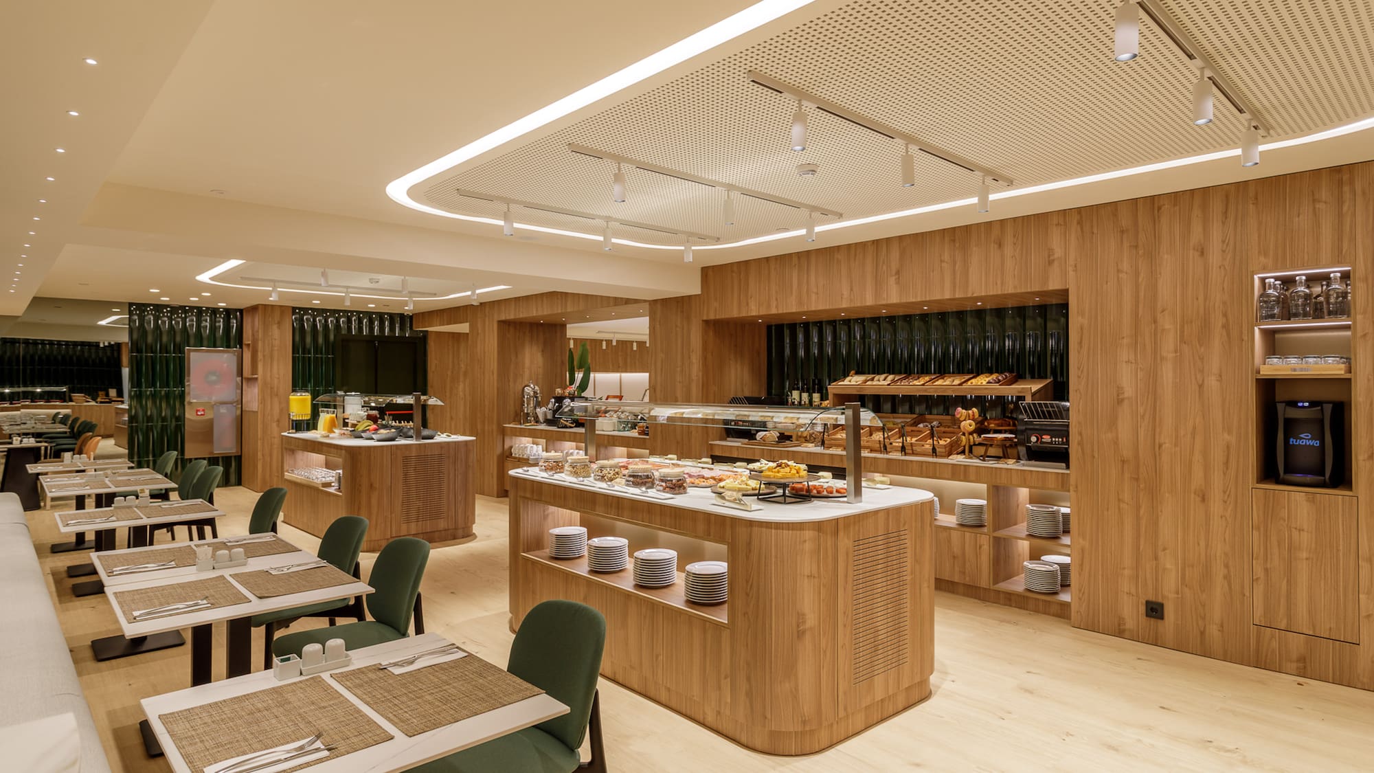 Modern hotel breakfast buffet and dining area with wooden finishes.