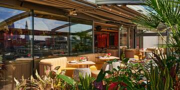 a restaurant with tables and chairs