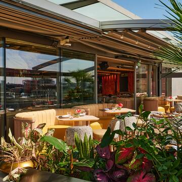a restaurant with tables and chairs