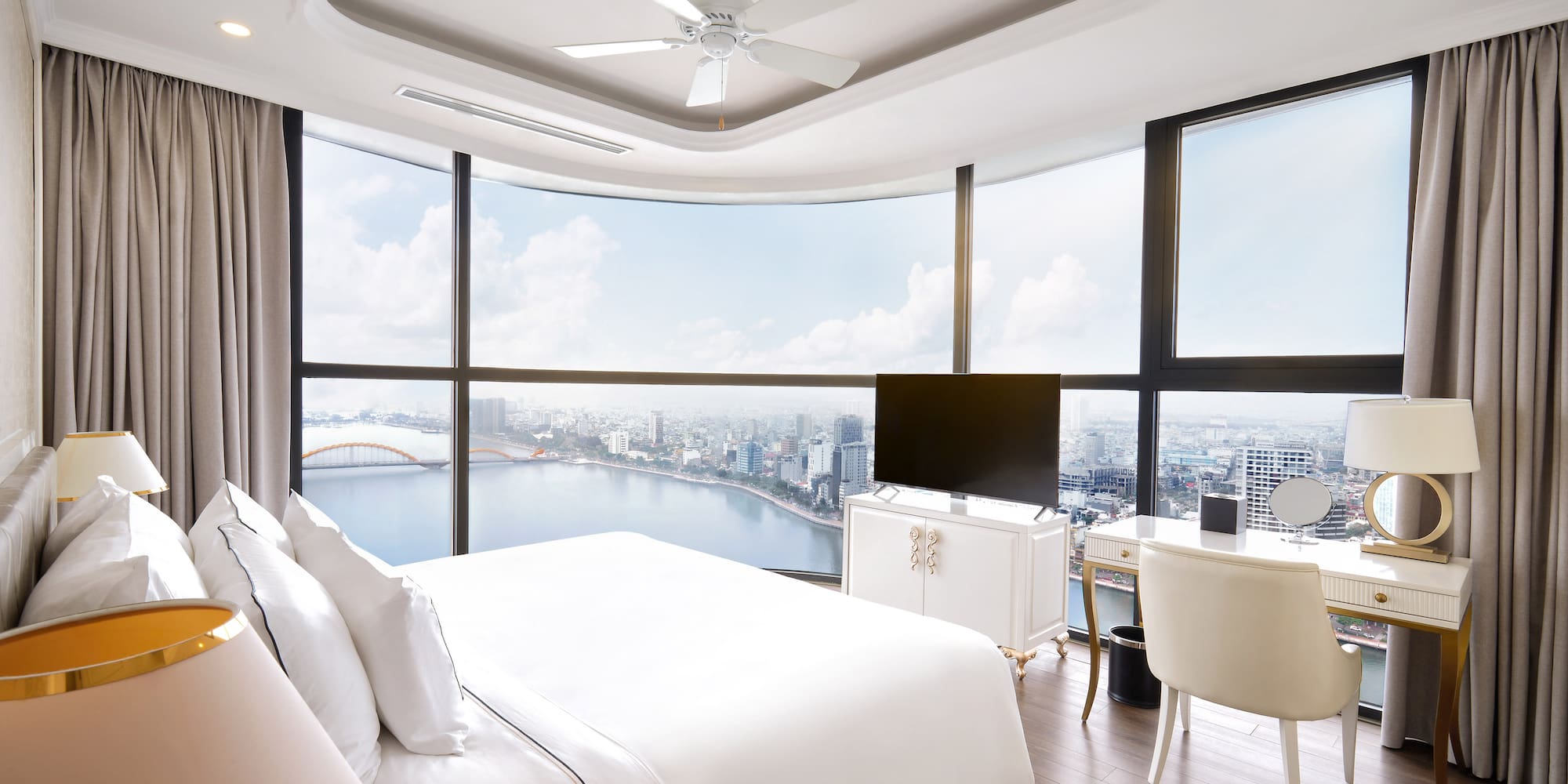 a room with a large window overlooking a city