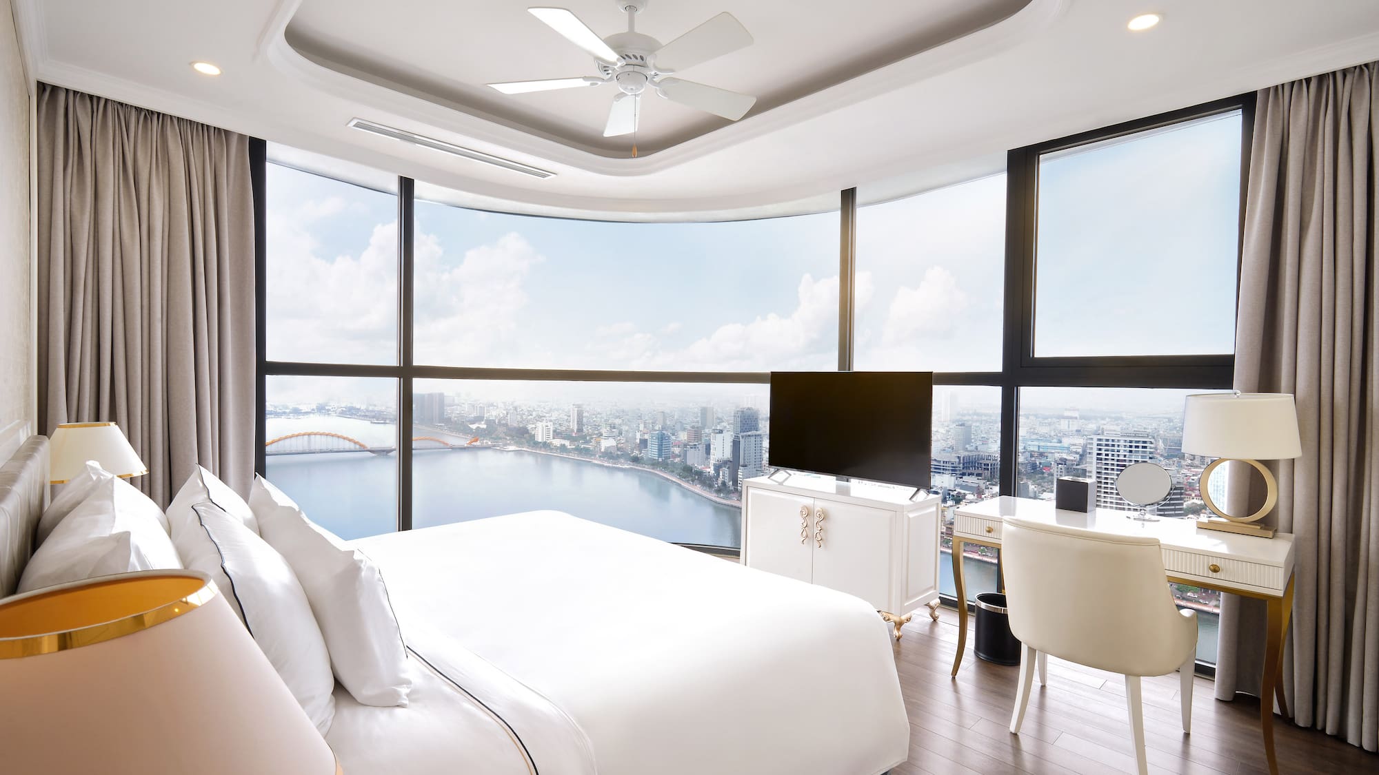 a room with a large window overlooking a city