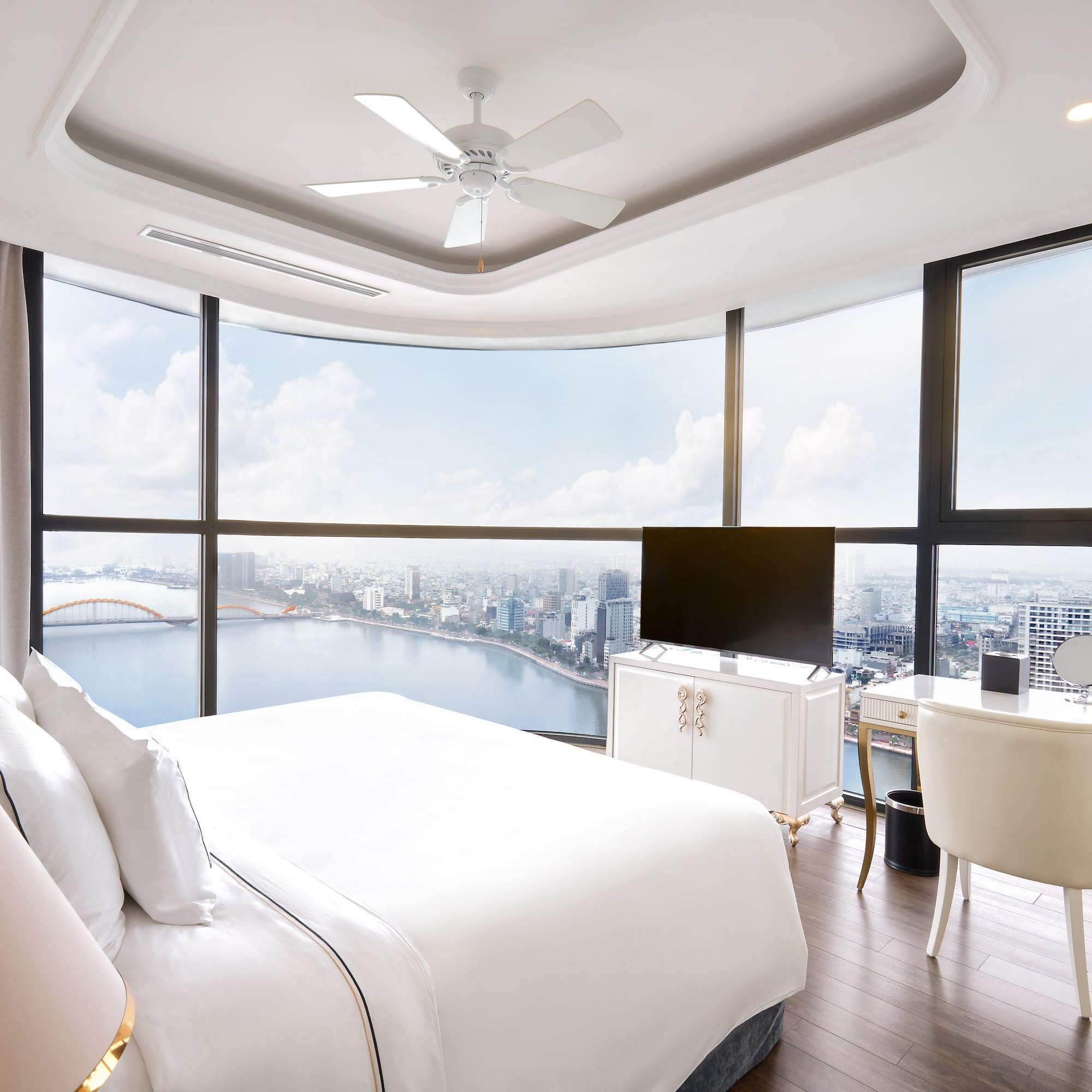 a room with a large window overlooking a city