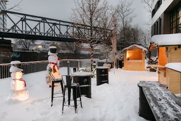 a snowman in a snowy yard