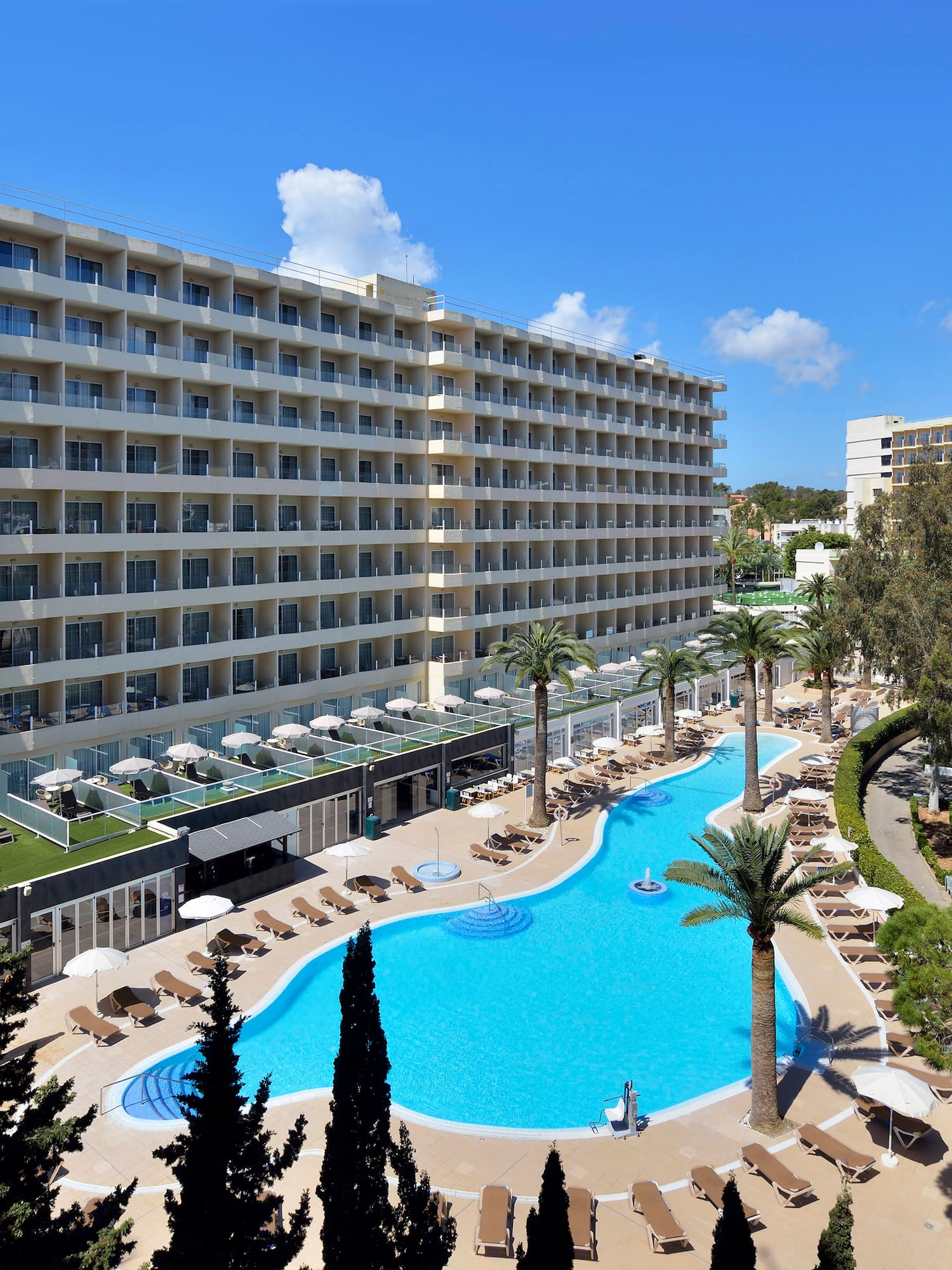 a swimming pool and a large building