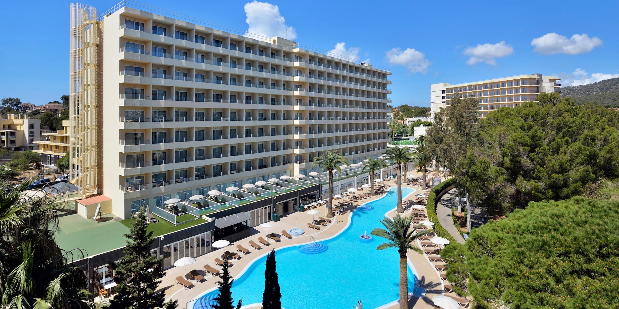 a swimming pool and a large building