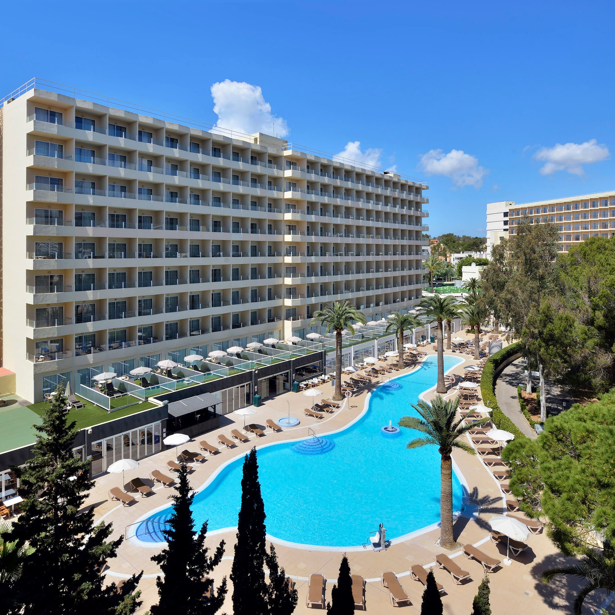 a swimming pool and a large building