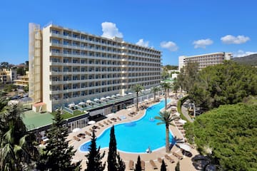 a swimming pool and a large building
