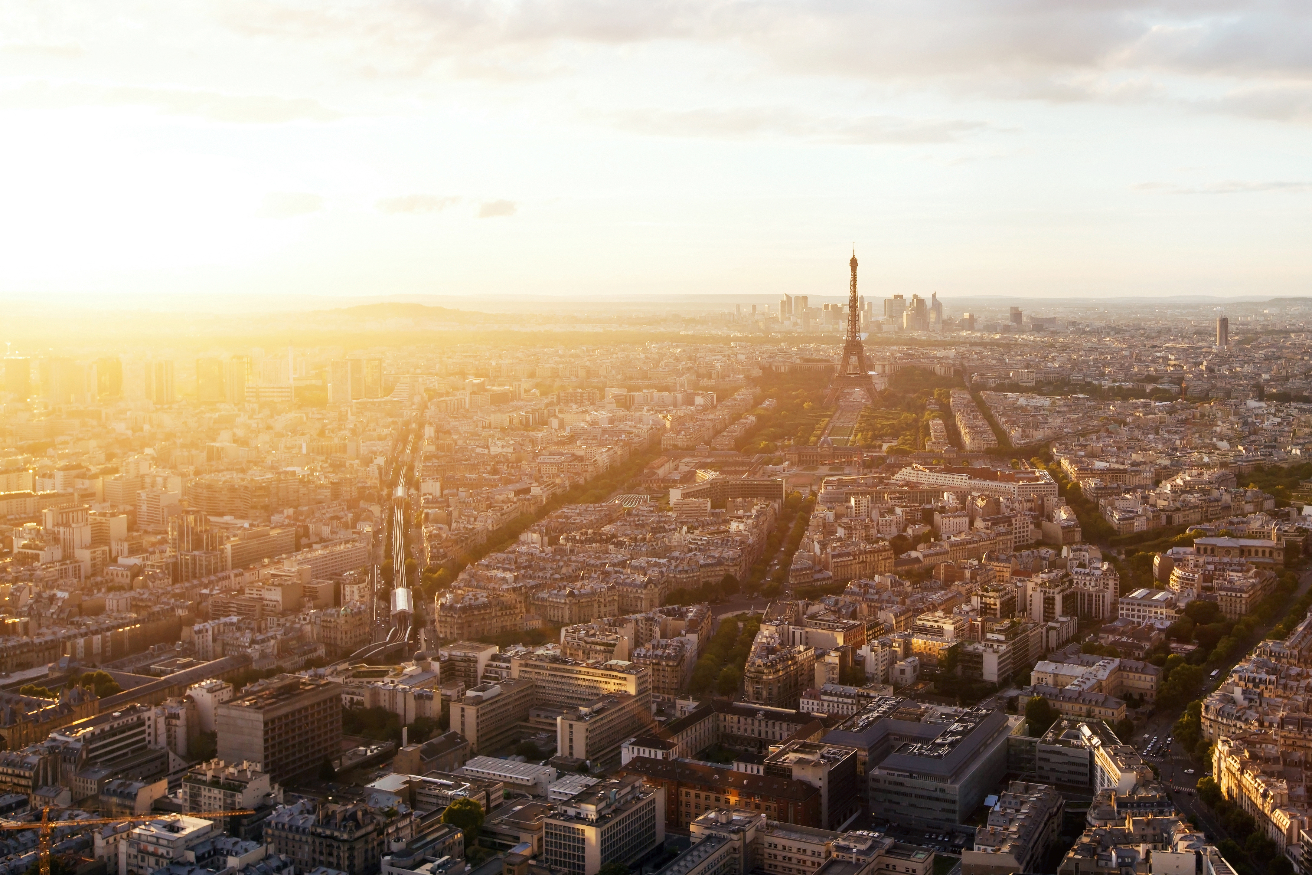 a city with a tower in the background