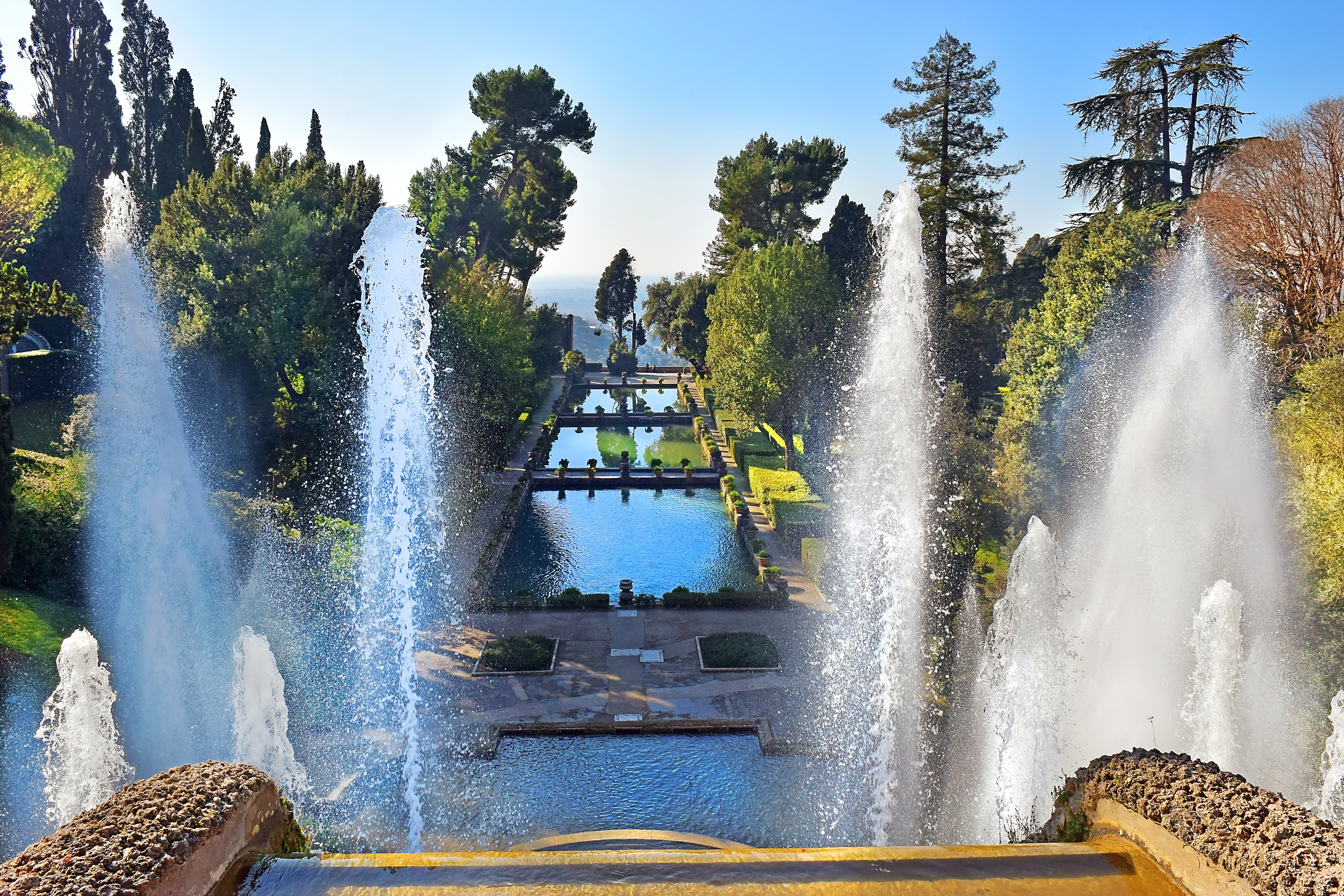 a water fountain in a park