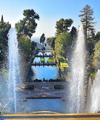 a water fountain in a park