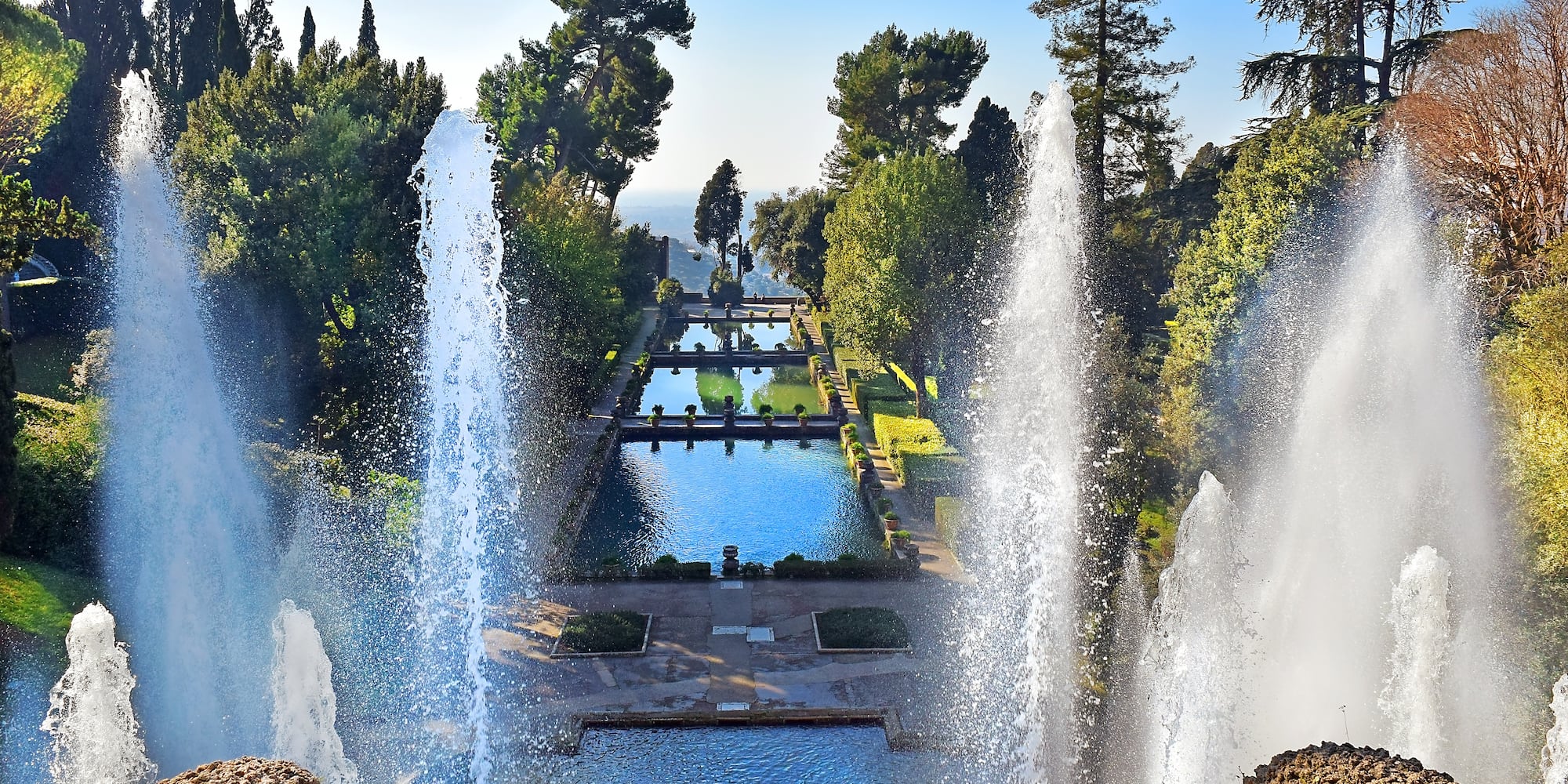 a water fountain in a park