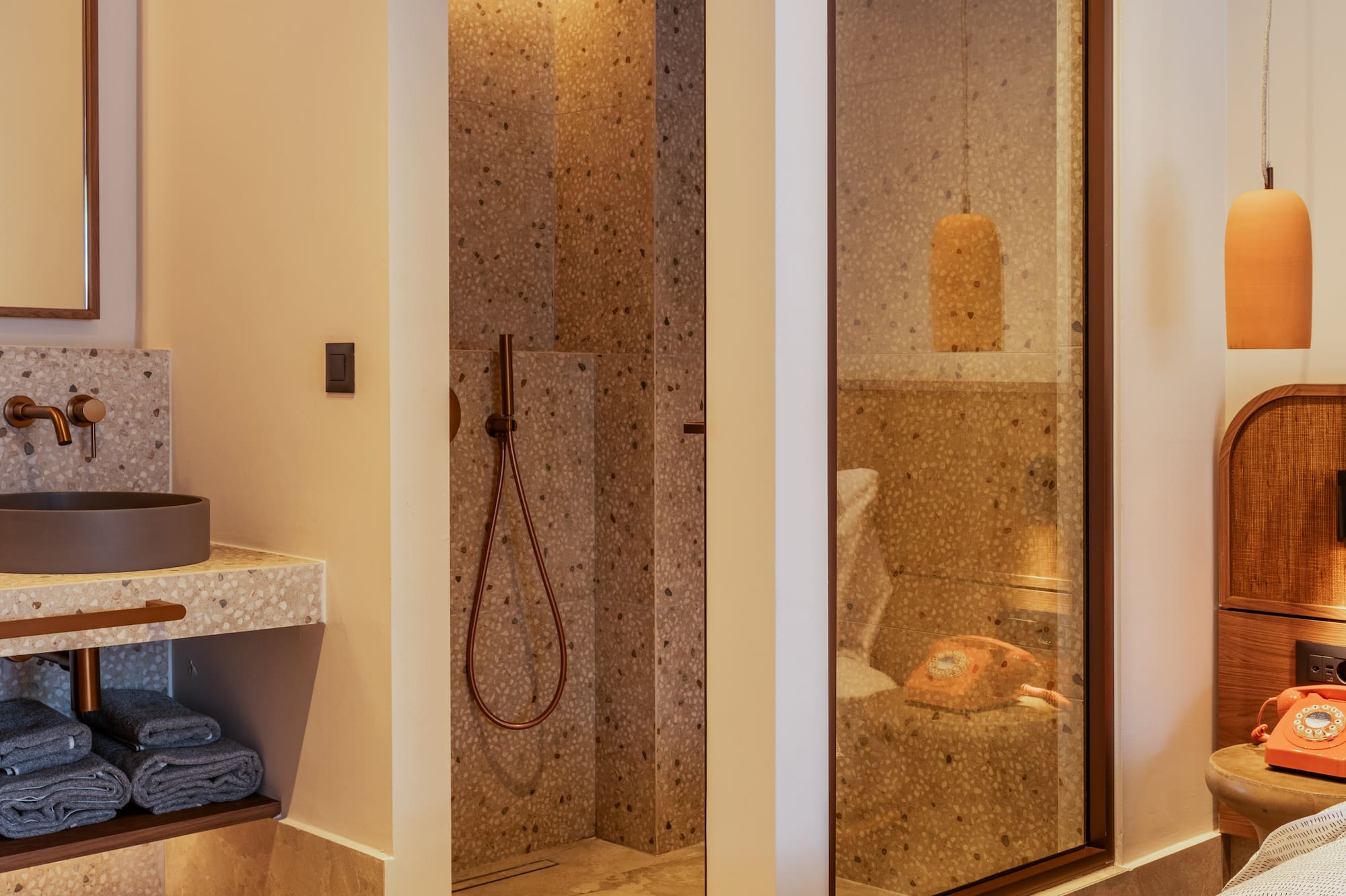 a bathroom with a shower and sink