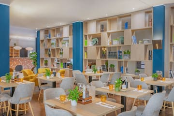 a room with tables and chairs