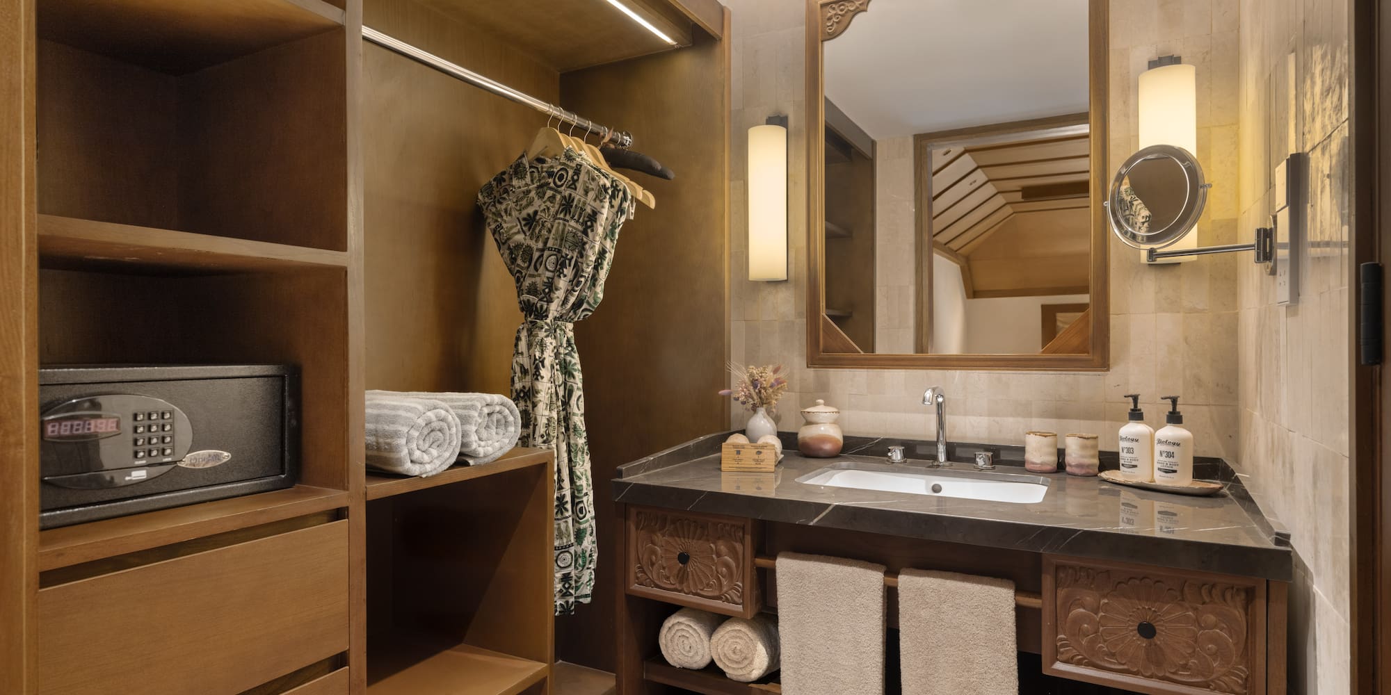 a bathroom with a mirror and a sink