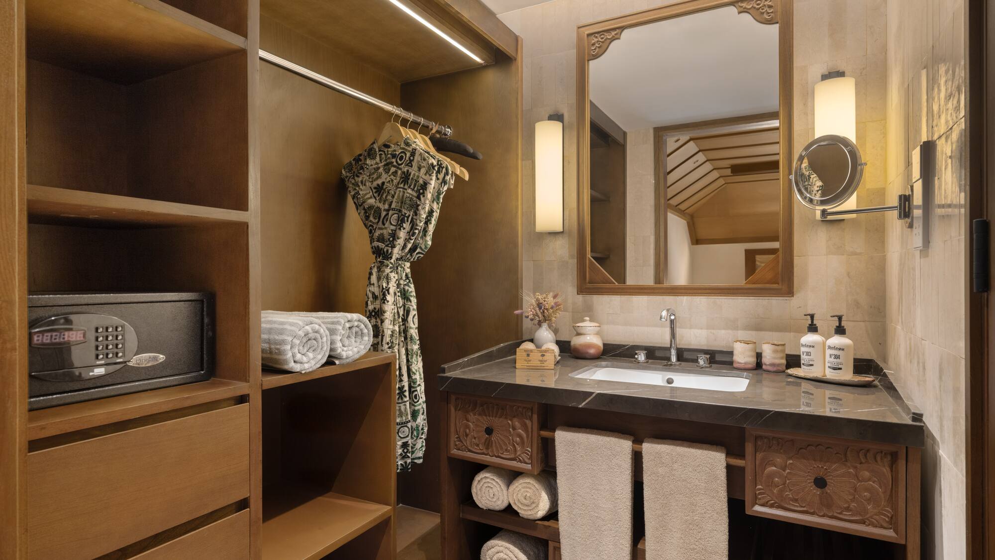 a bathroom with a mirror and a sink