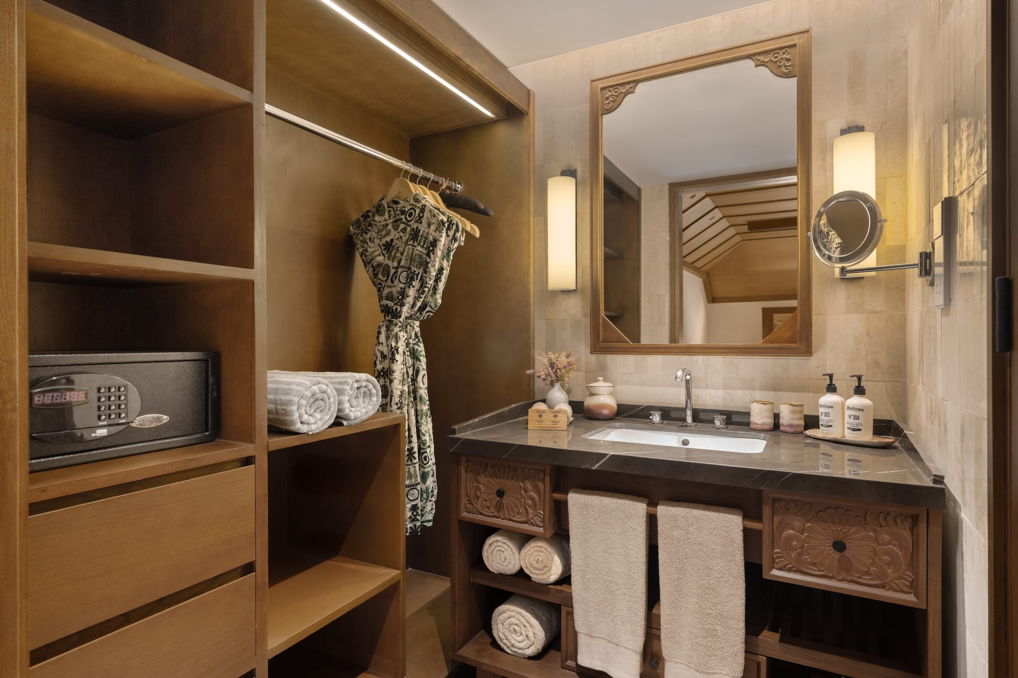 a bathroom with a mirror and a sink