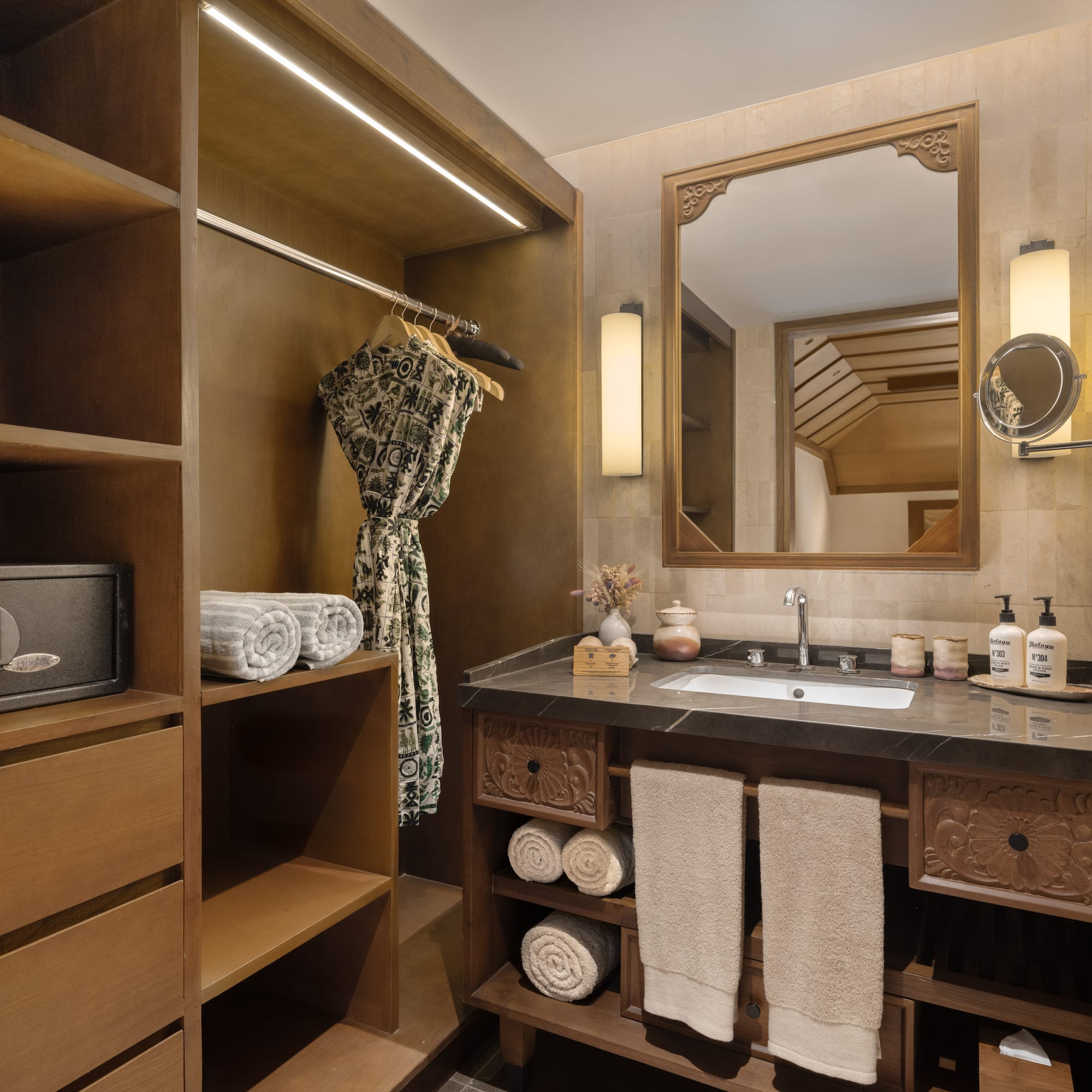 a bathroom with a mirror and a sink