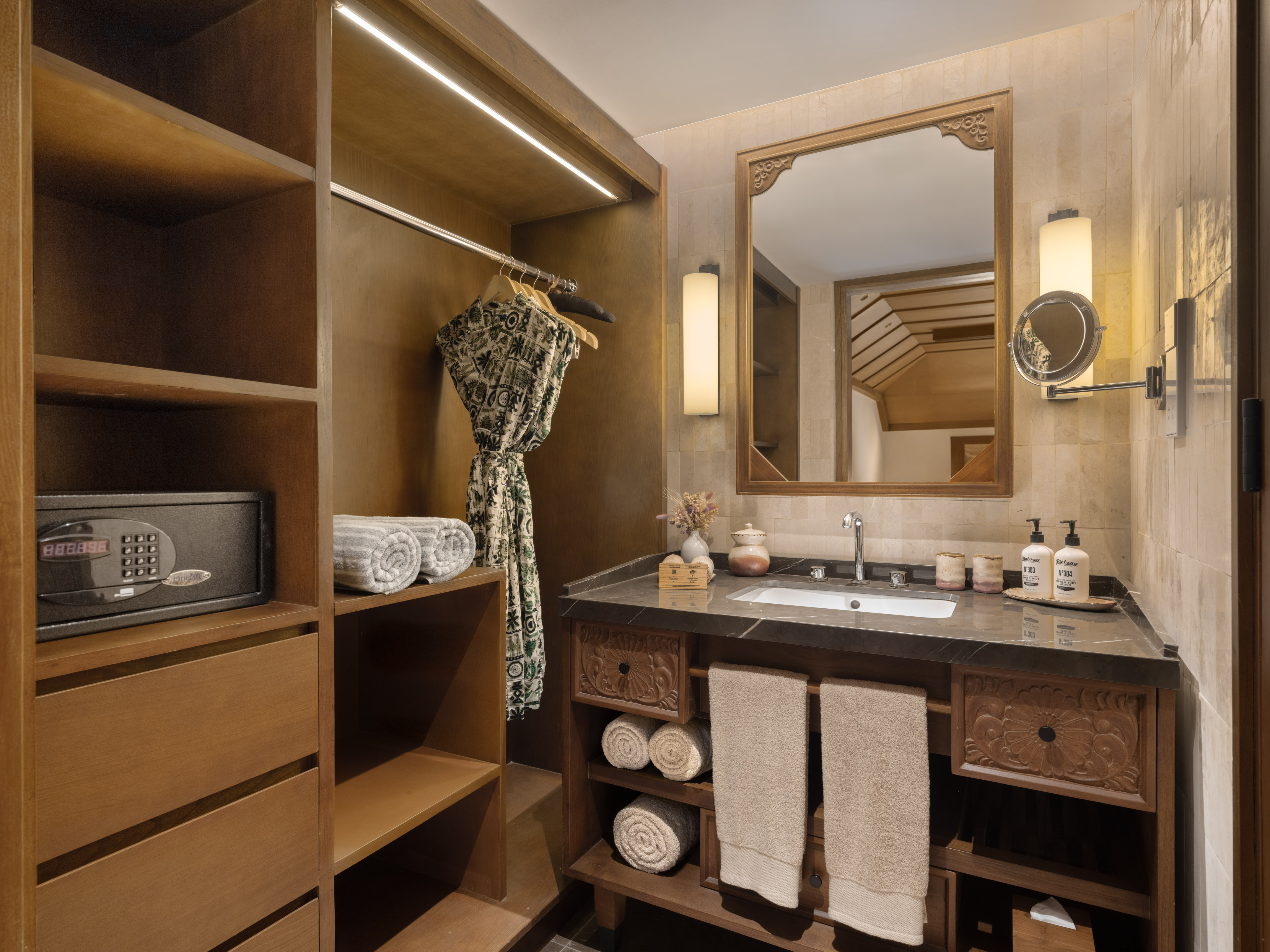 a bathroom with a mirror and a sink