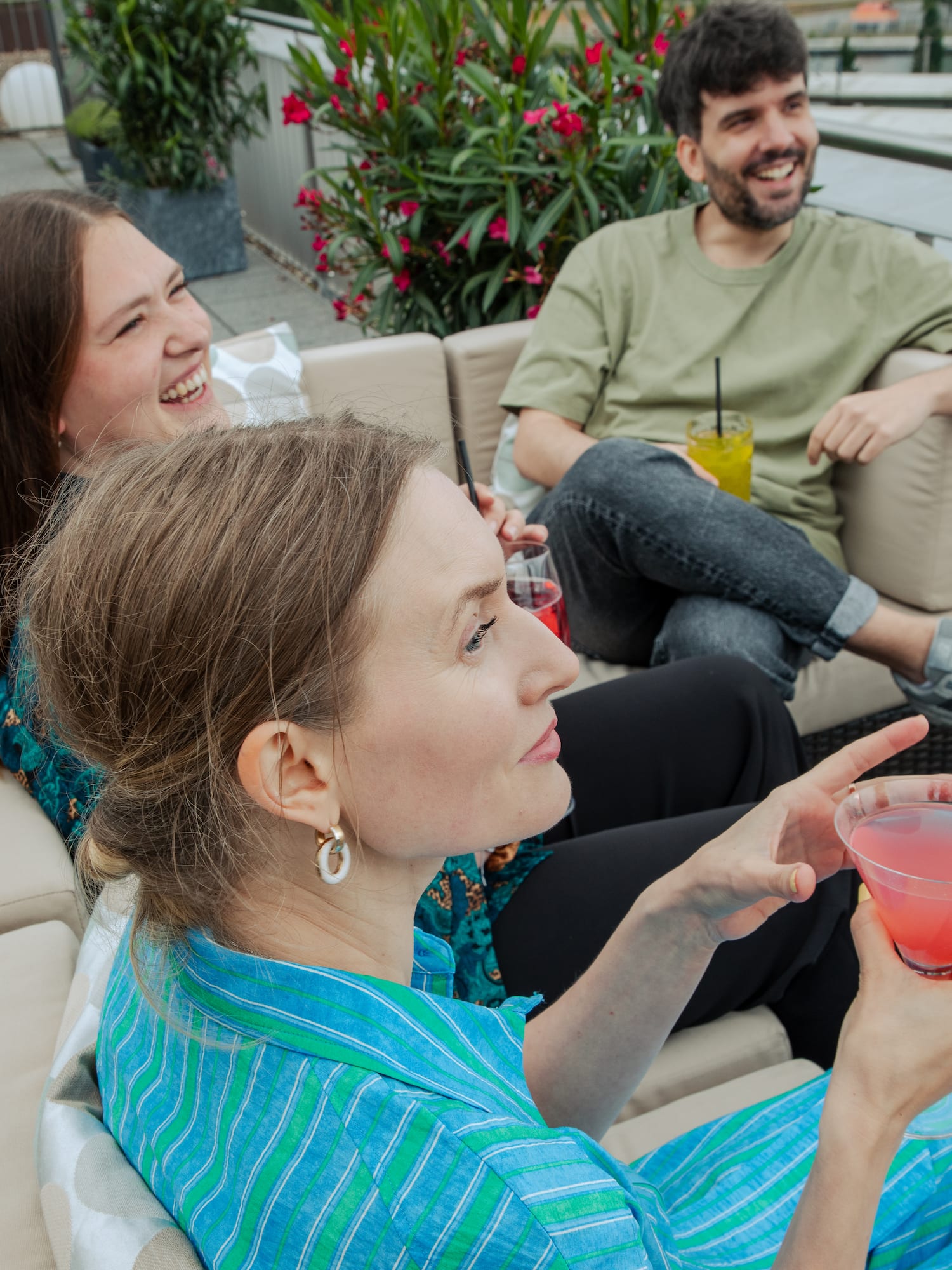 a group of people sitting on a couch